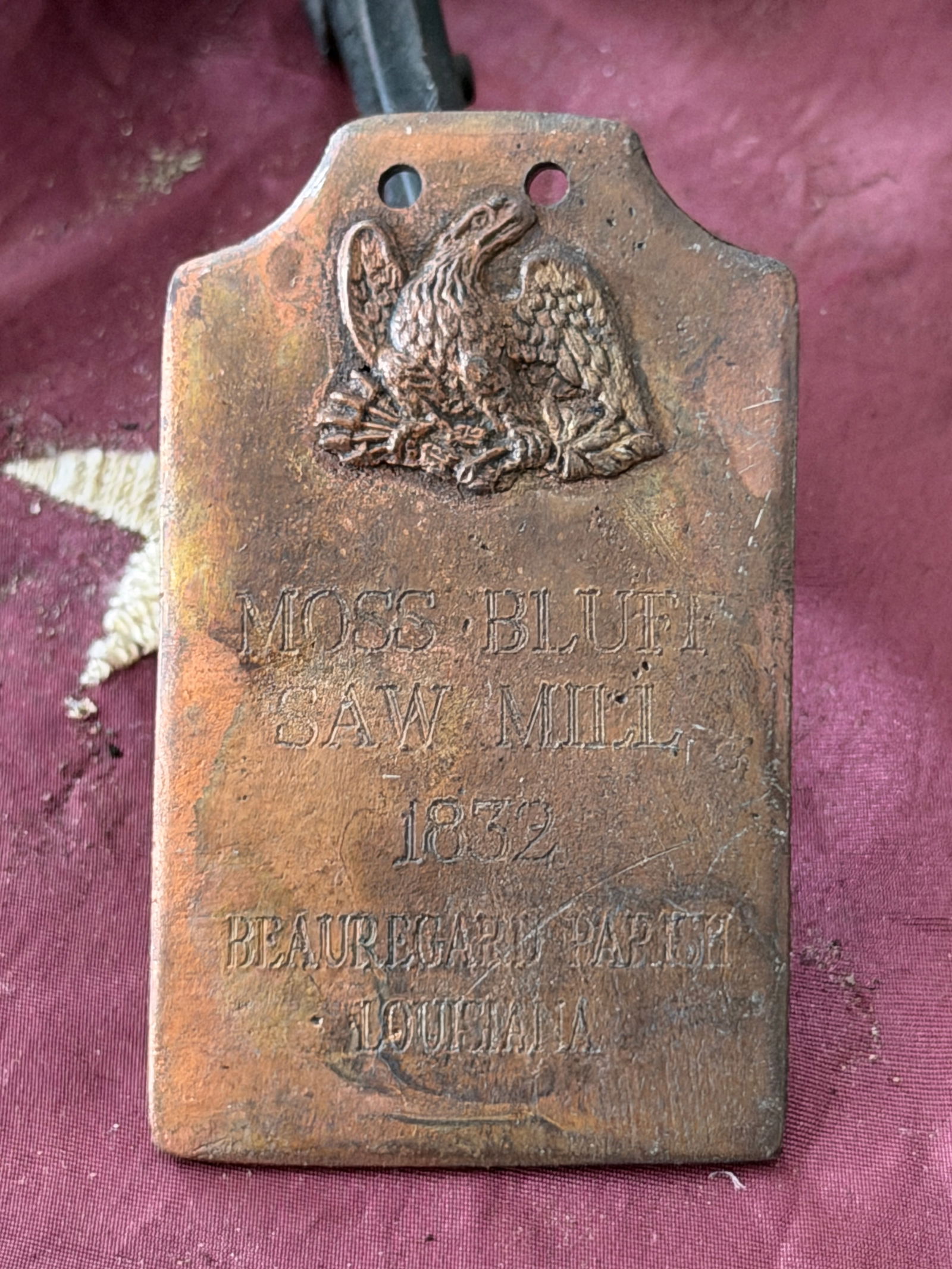 Mill Identification Tag, Moss Bluff Saw Mill, Beauregard Parish, Louisiana (1832): This engraved metal identification tag dates to 1832, placing it in the early antebellum period of Louisiana’s industrial development. The tag is associated with the Moss Bluff Saw Mill in Beauregar