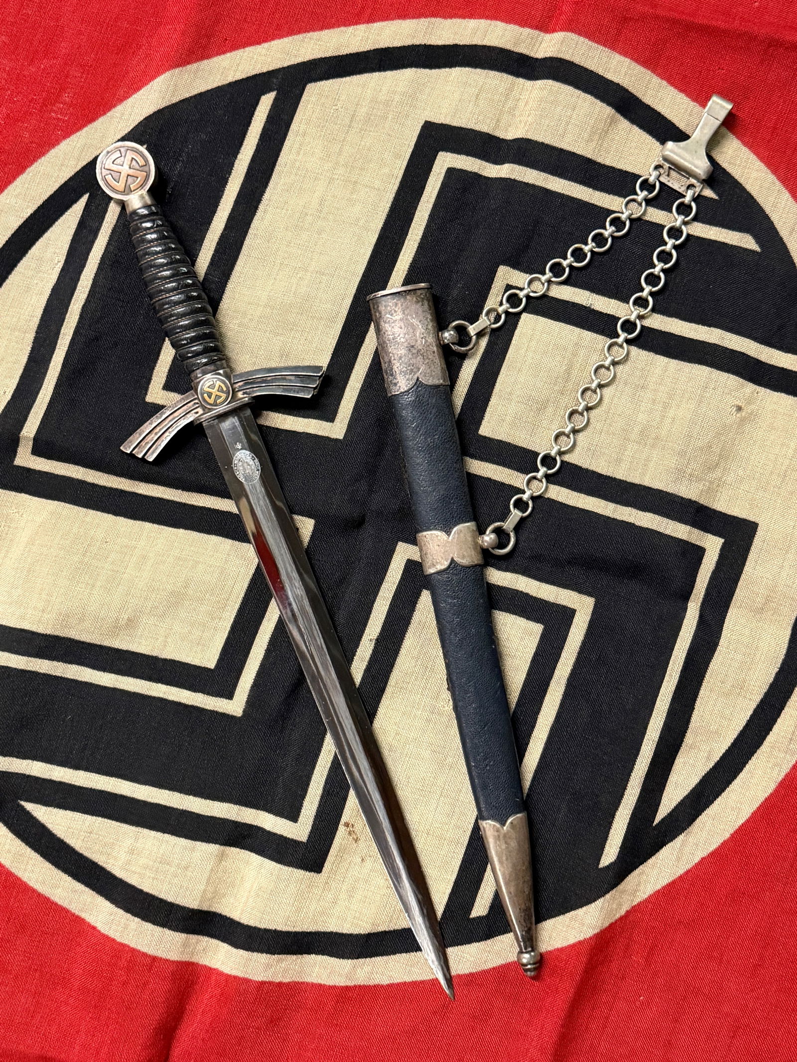 German Luftwaffe Dagger with Scabbard and Hanger, World War II By Paul Weyersberg & Co. Solingen: This ceremonial dagger is an example of a German Luftwaffe (Air Force) officer’s sidearm from the Second World War, circa 1935–1945. Unlike combat knives, Luftwaffe daggers were primarily symbolic