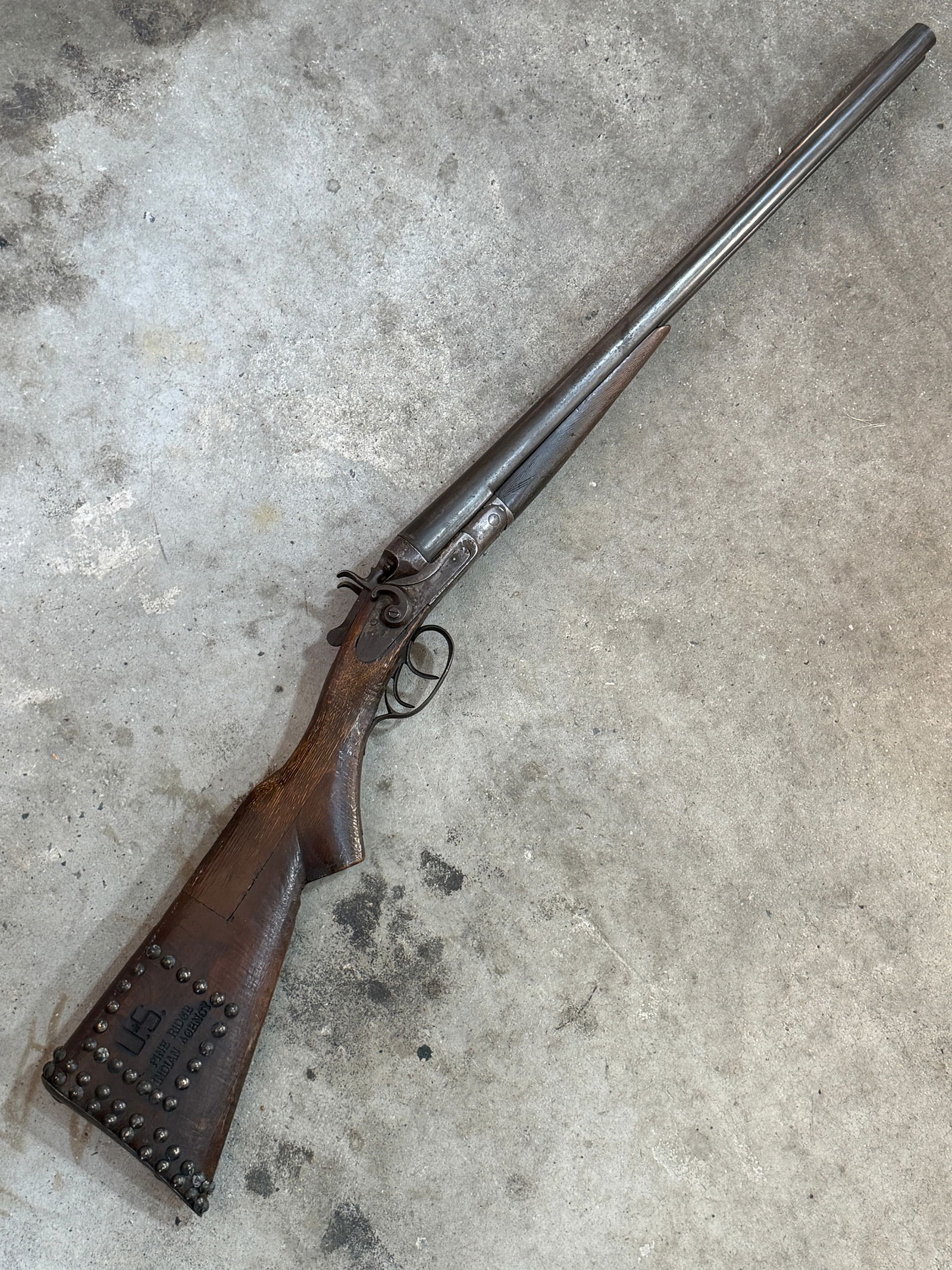 1800's Belgian Double-Barrel Shotgun – Pine Ridge Indian Agency Issue, U.S. Inspection Marks: This is a rare and historically significant antique double-barrel shotgun with documented markings indicating issue and use by the Pine Ridge Indian Agency, a U.S. government agency historically assoc