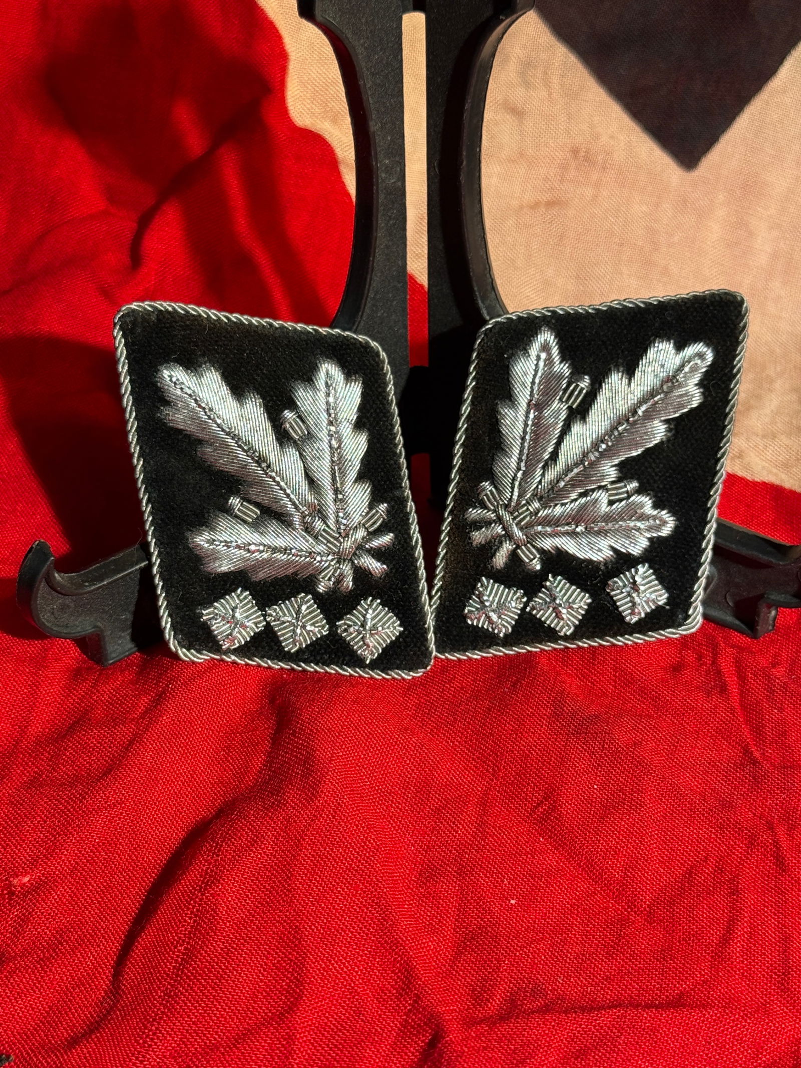WW2 German SS Obergruppenführer Collar Tabs, Waffen-SS Uniform Insignia By RZM, Nazi Germany, c.: Pair of Waffen-SS collar tabs representing the rank of Obergruppenführer, one of the highest ranks within the SS hierarchy during the Third Reich. The tabs feature silver bullion oak leaves and acorn