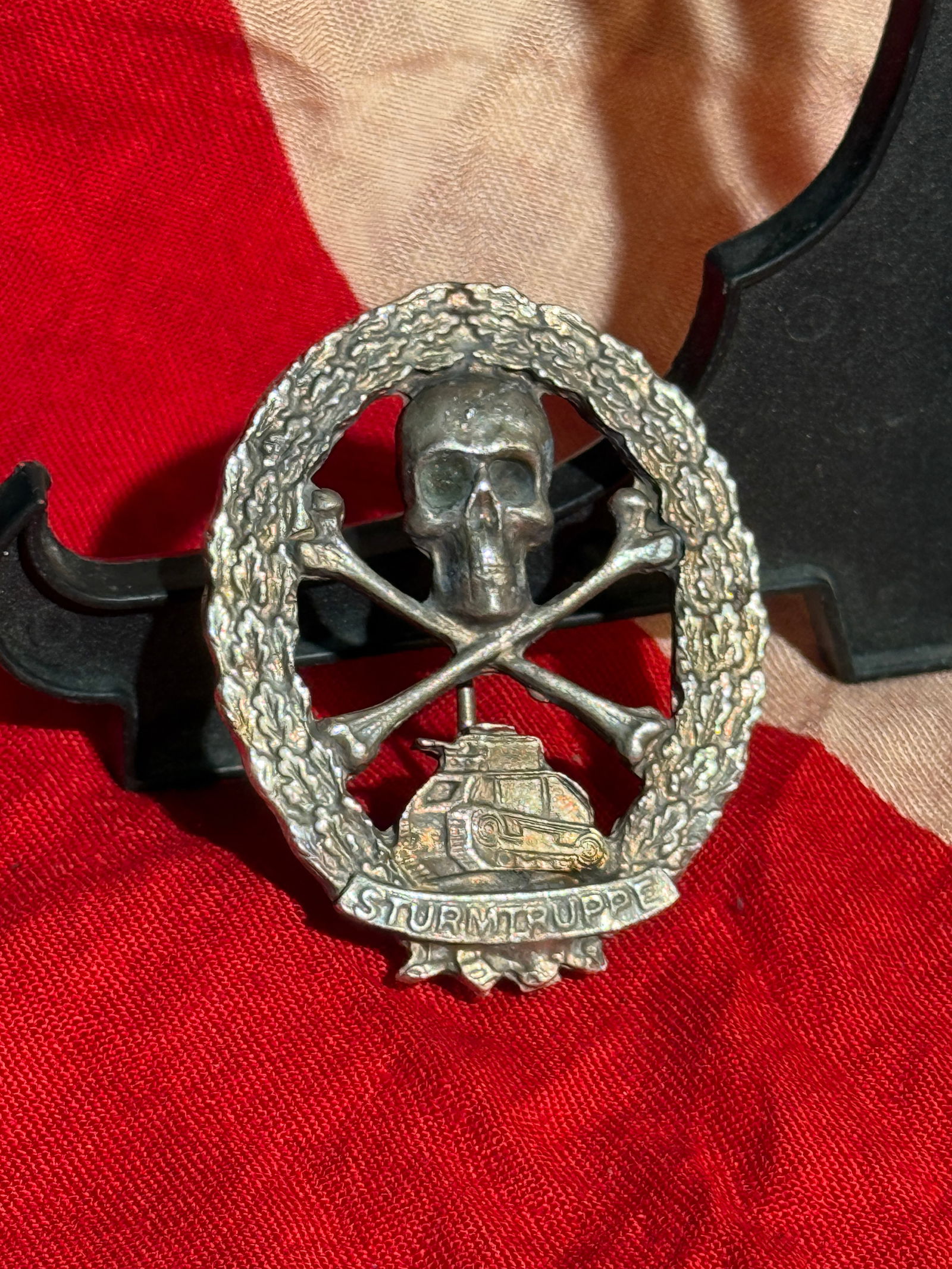 WW2 German Sturmtruppe Veterans Commemorative Badge, Interwar Period: This metal commemorative badge honors the German Sturmtruppen (stormtroopers) of the First World War—elite assault units trained for infiltration and shock tactics. The design features a skull and c
