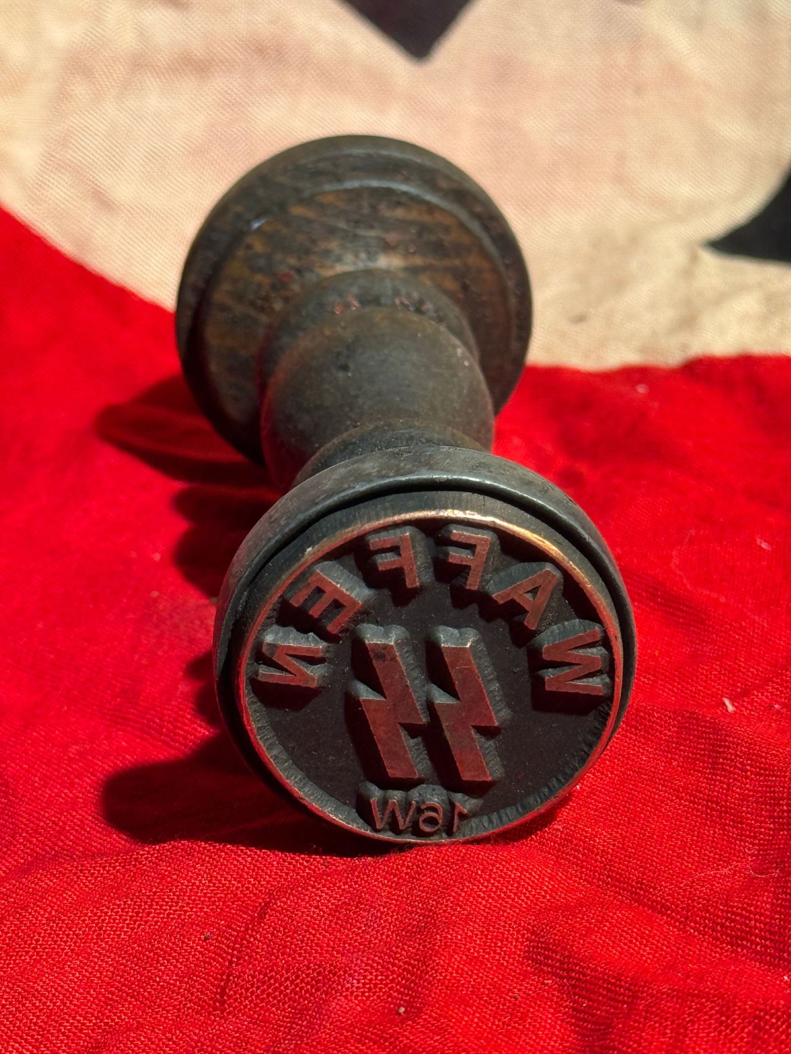 WW2 German Waffen-SS “Meine Ehre heißt Treue?? Seal Stamp, Nazi Germany, c. 1930s–1940s: Carved wooden-handled seal stamp bearing the insignia and motto of the Waffen-SS, the armed branch of the Nazi Party’s Schutzstaffel. The circular die displays the SS double-rune emblem at center su