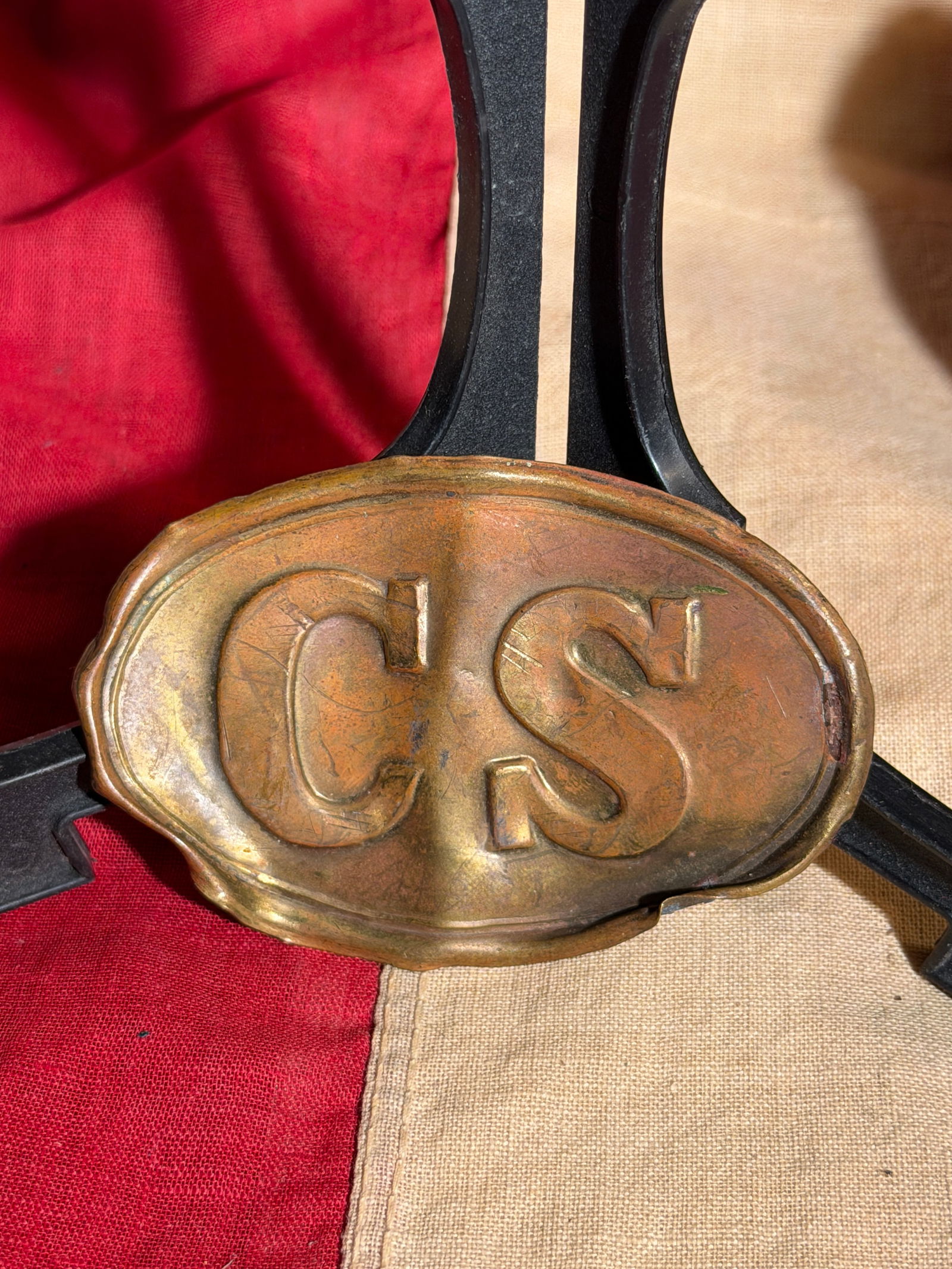 Civil War Confederate Army “C.S.?? Belt Plate Relic (Civil War Era): This oval brass belt plate bearing the raised letters “C.S.” is a Civil War–era waist belt buckle associated with the Confederate States Army (1861–1865). Such plates were worn on leather