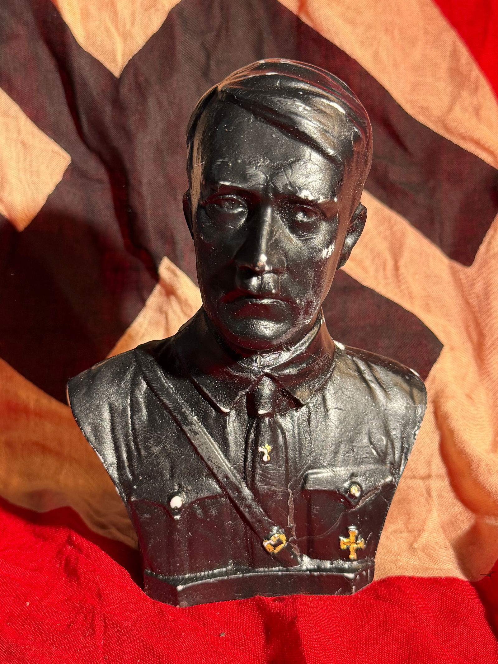 WW2 German Bust of Adolf Hitler with RZM Label, Nazi Germany (Third Reich), c. 1933–1945: This small black bust depicts Adolf Hitler (1889–1945), leader of Nazi Germany and head of the National Socialist German Workers’ Party (NSDAP). The figure shows Hitler in a stylized political