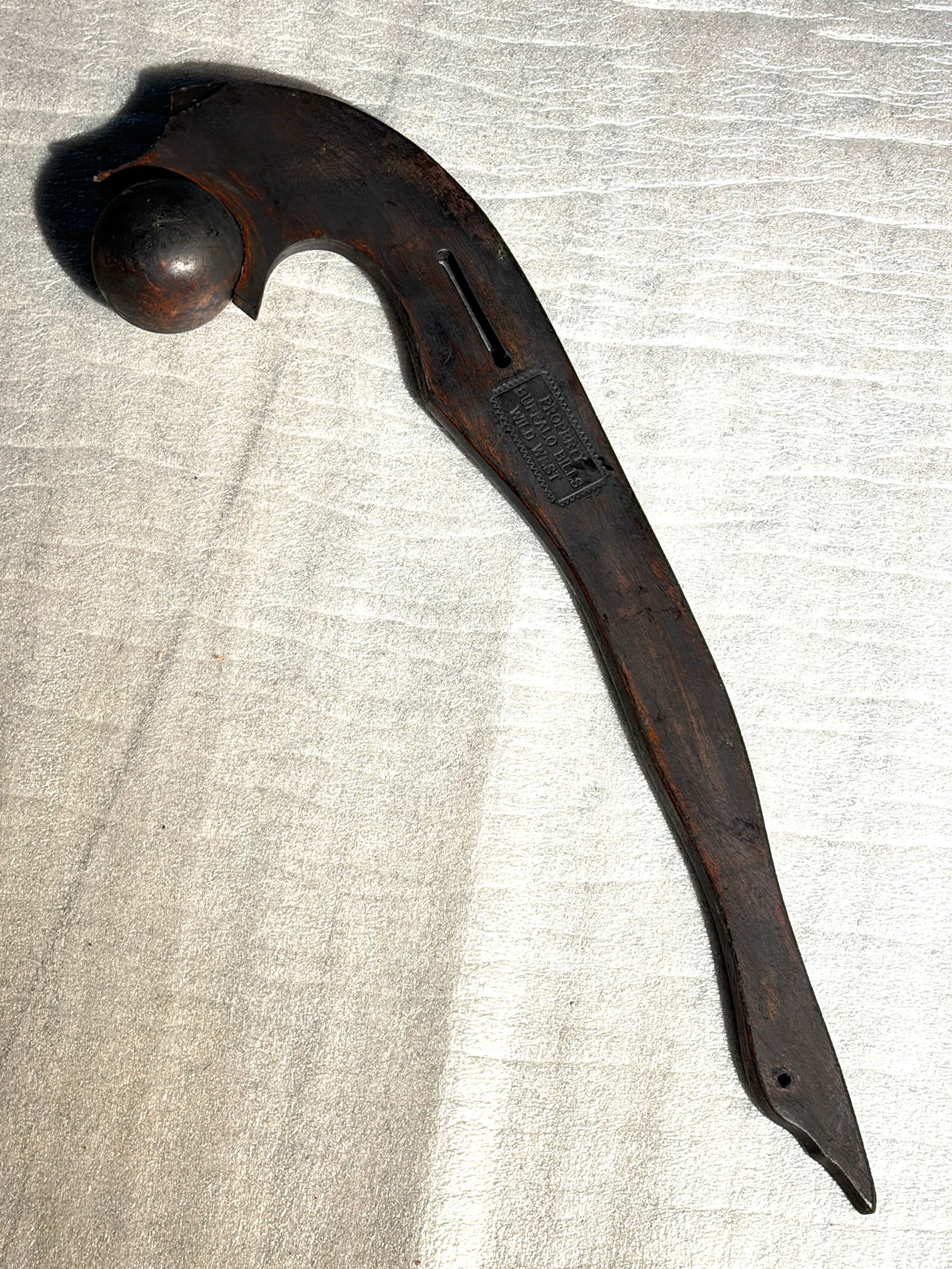 1800's Eastern Plains Ball-Head War Club, Attributed to Sioux (Lakota/Dakota): Carved hardwood war club of the Eastern Plains ball-head type, likely made by a Sioux (Lakota or Dakota) craftsman in the 18th–19th century. The weapon is carved from a single piece of dense hardwoo