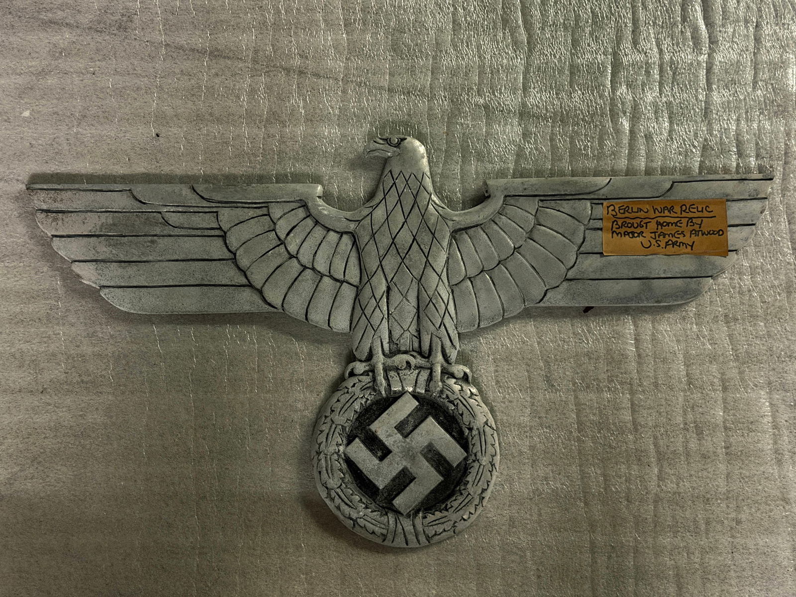 German Reichsbahn Eagle Emblem – Recovered from Berlin, World War II: This large metal German Reichsbahn eagle emblem was originally mounted on a railway building or infrastructure associated with the Deutsche Reichsbahn, the national railway system of Germany during th