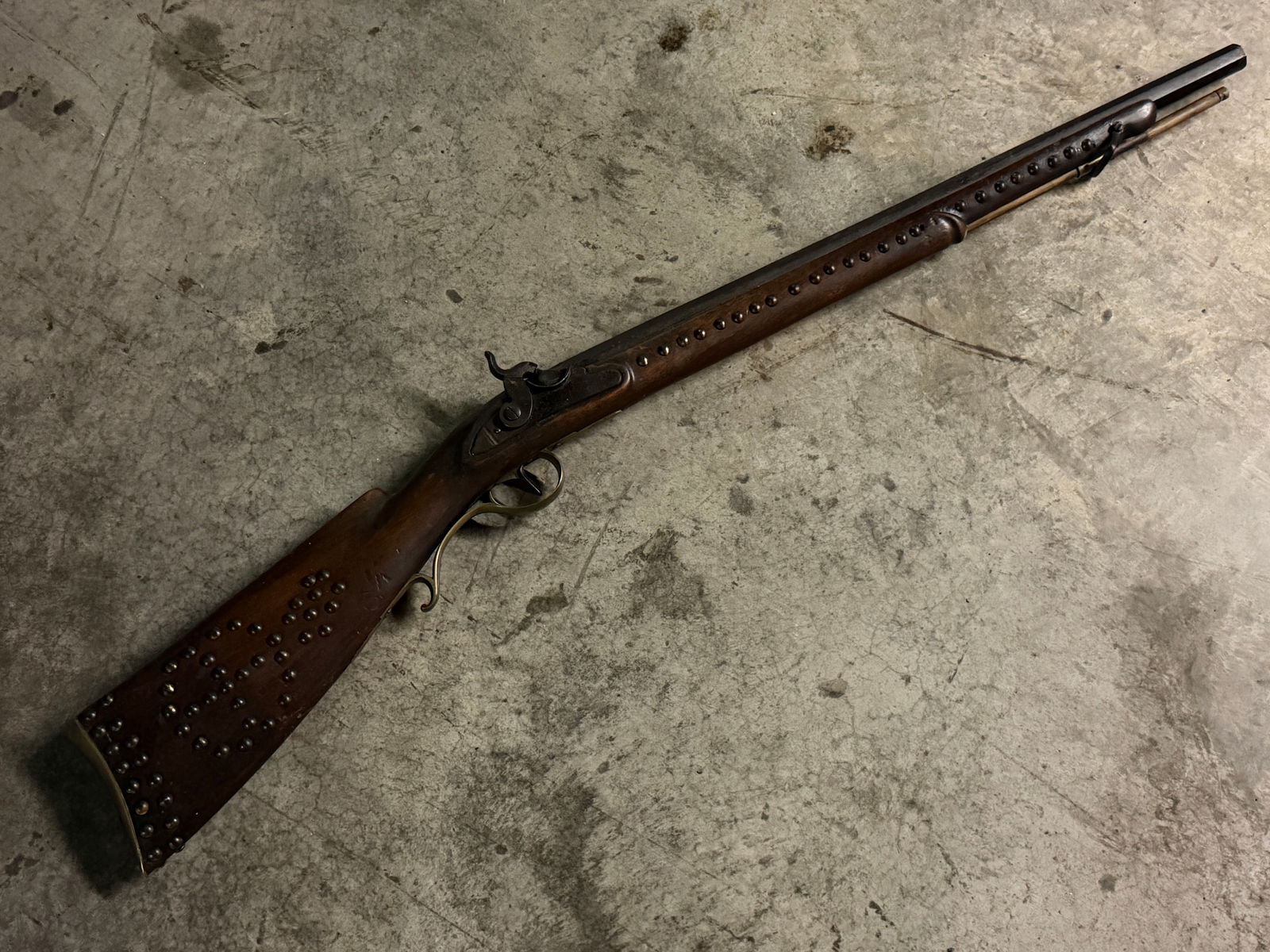 1800's Antique Native American Tacked Plains Rifle – 19th Century Frontier Trade Gun: This percussion rifle represents a frontier trade firearm used by Native Americans on the Northern Plains during the late 19th century. The long gun features a walnut stock decorated with brass tack o