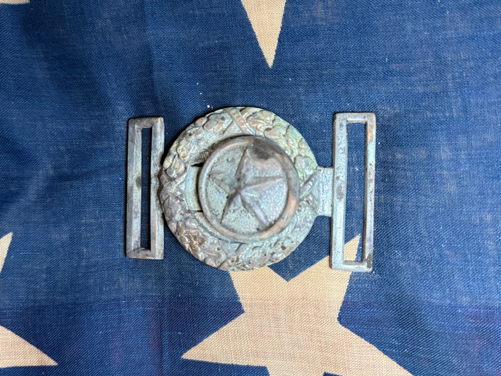 Civil War Confederate Texas Star Two-Piece Belt Buckle, c. 1861–1865: Civil War-era Confederate two-piece belt buckle featuring the iconic Texas five-point star centered within a wreath design. This style of buckle is strongly associated with Texas troops serving in the
