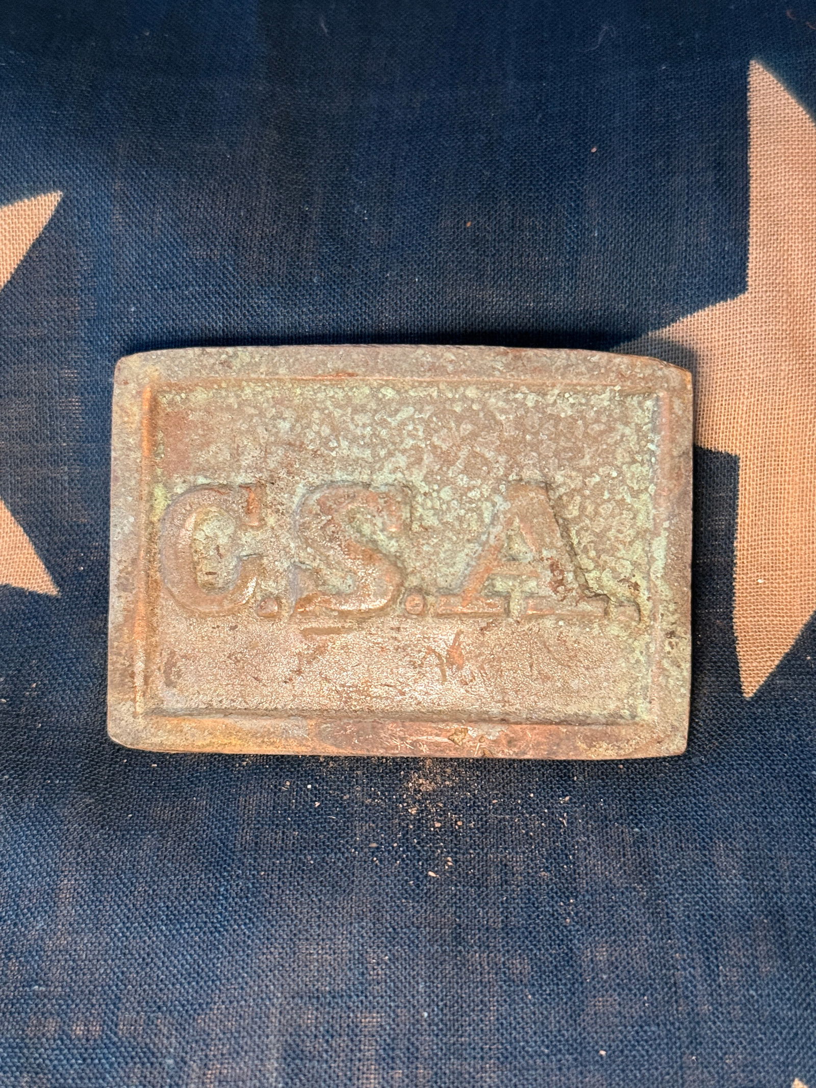 Civil War Confederate States of America (C.S.A.) Belt Plate: This rectangular brass belt plate bears the raised letters “C.S.A.”, representing the Confederate States of America. Such plates were used on the waist belts of soldiers serving in the Confede