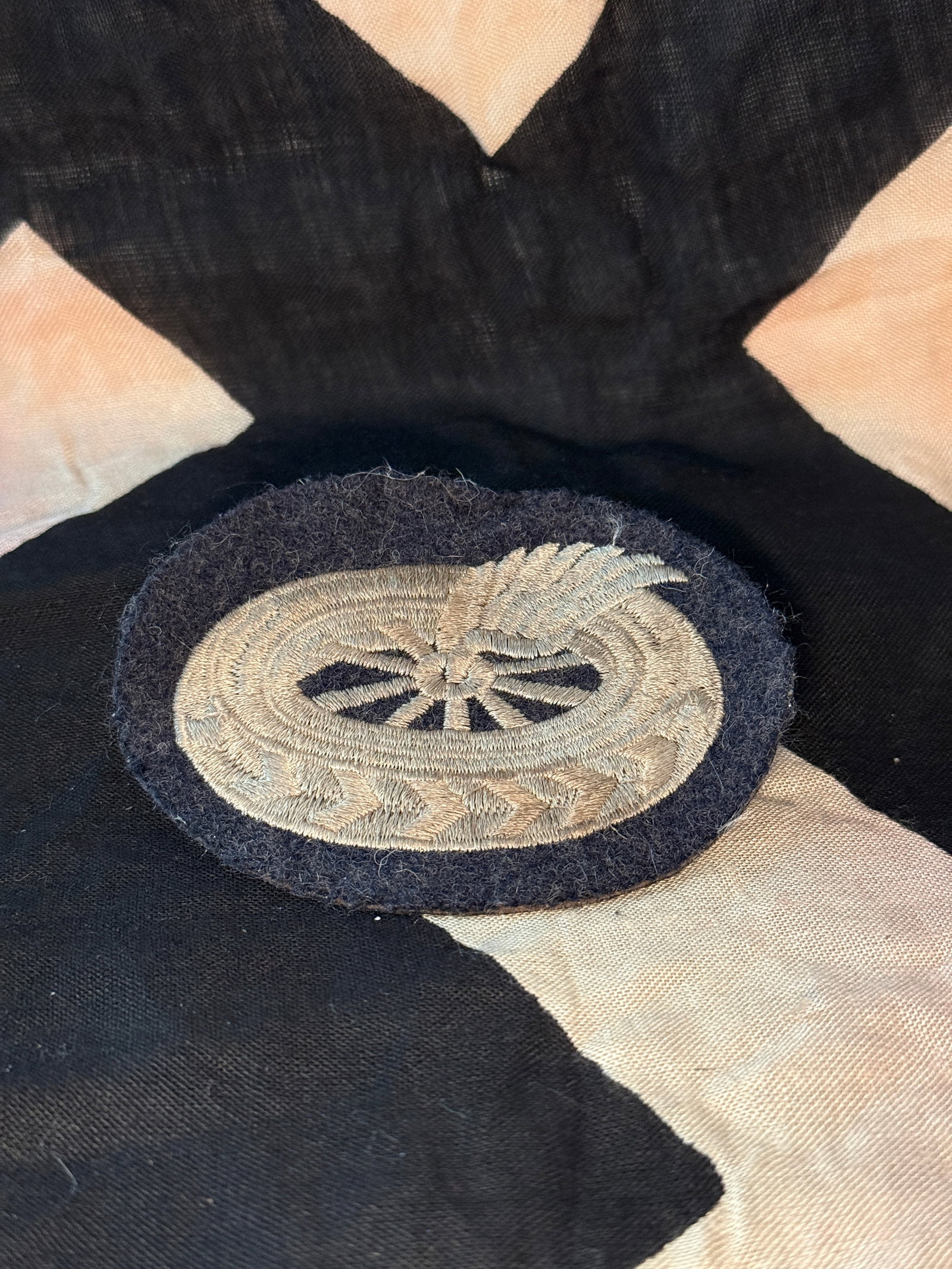 WW2 German Army Driver / Motor Transport Trade Badge (Kraftfahrerabzeichen): This embroidered cloth insignia represents a German Army motor transport or driver specialist trade badge, worn by personnel trained to operate and maintain military vehicles during the Second World W