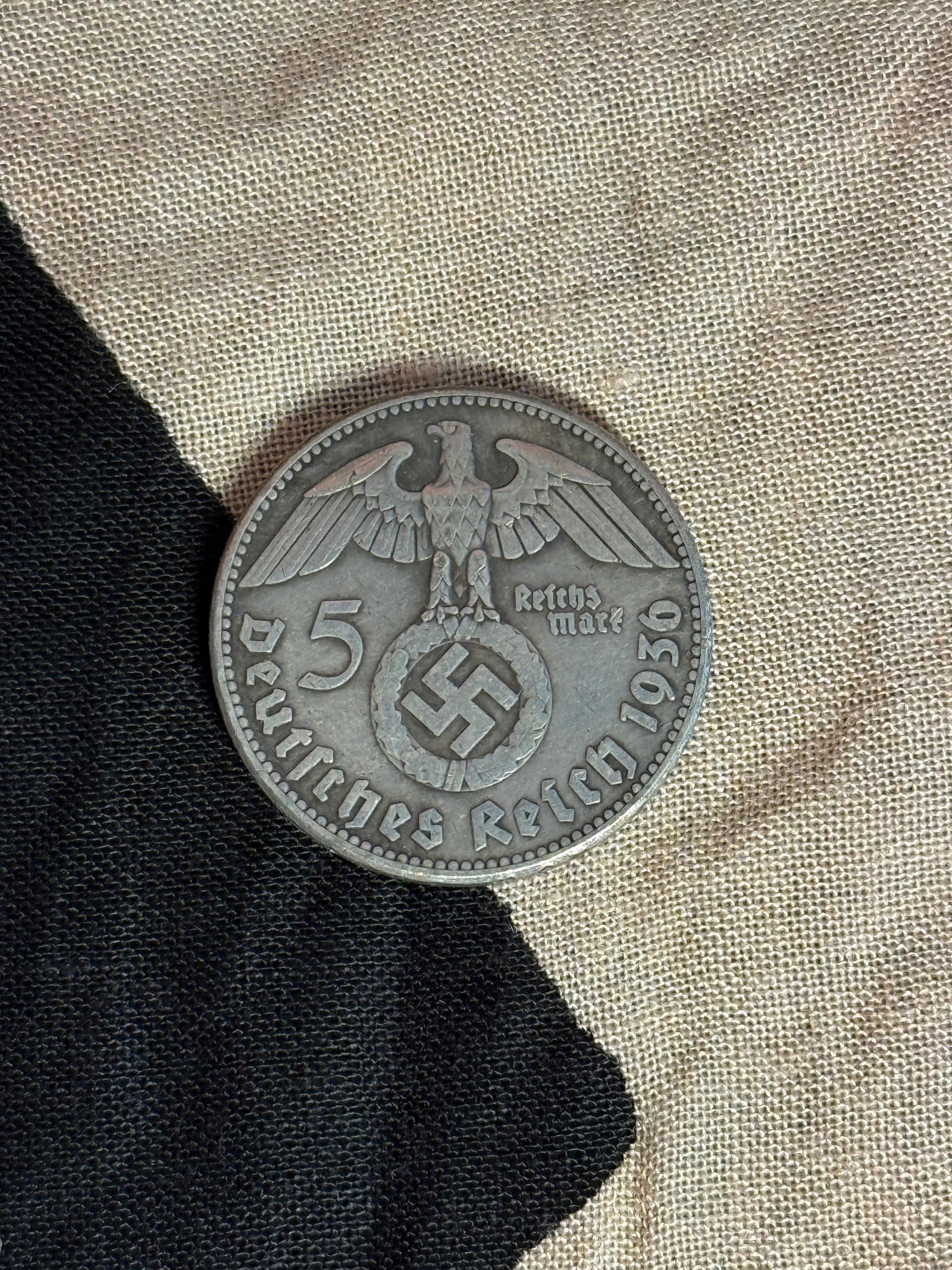 1936 GERMAN 5 Reichsmark Coin Featuring Paul von Hindenburg: This German 5 Reichsmark coin depicts President Paul von Hindenburg on one side, with his name and dates, and the reverse displaying a national eagle above a swastika, encircled by the inscription “