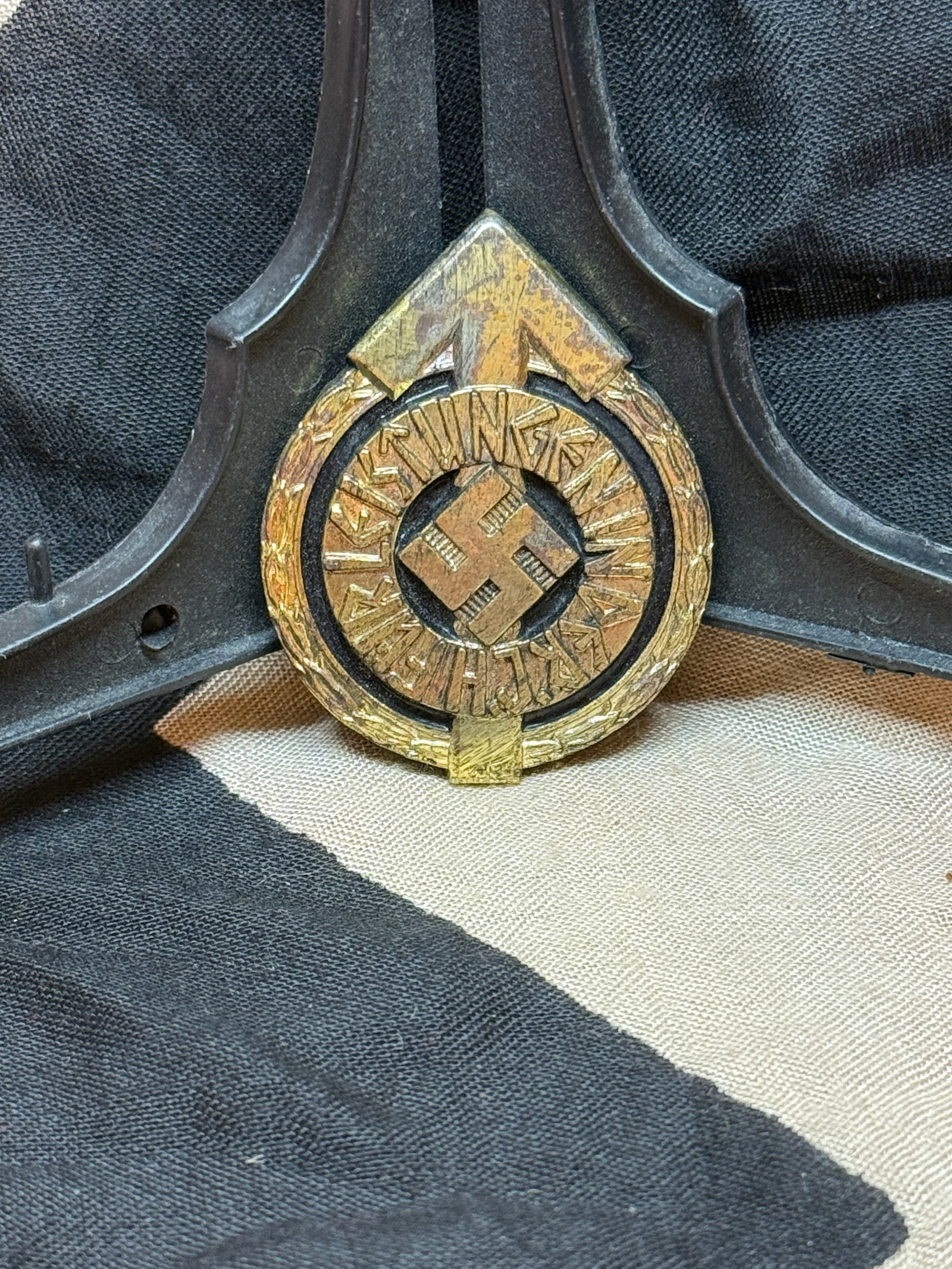 World War II German Hitler Youth Proficiency Badge (HJ-Leistungsabzeichen), Silver Grade By RZM: A Hitler Youth Proficiency Badge (Hitlerjugend Leistungsabzeichen), awarded to members who successfully completed rigorous physical, ideological, and paramilitary testing. The badge features a circula