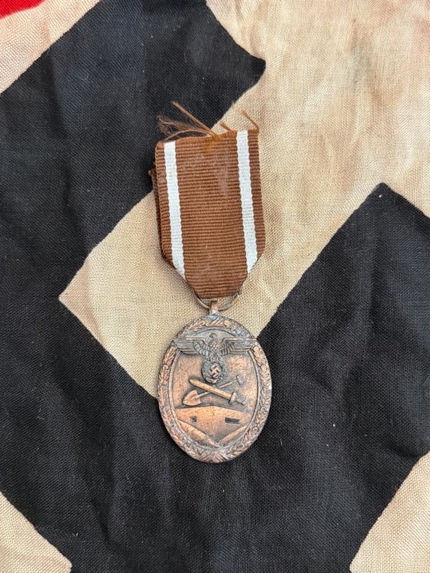 WWII German Eastern Front Service Medal (Winterschlacht im Osten 1941/42): This medal, commonly known as the Eastern Front Medal, was awarded to German military personnel who served during the harsh winter campaign of 1941–1942 against the Soviet Union. The obverse feature