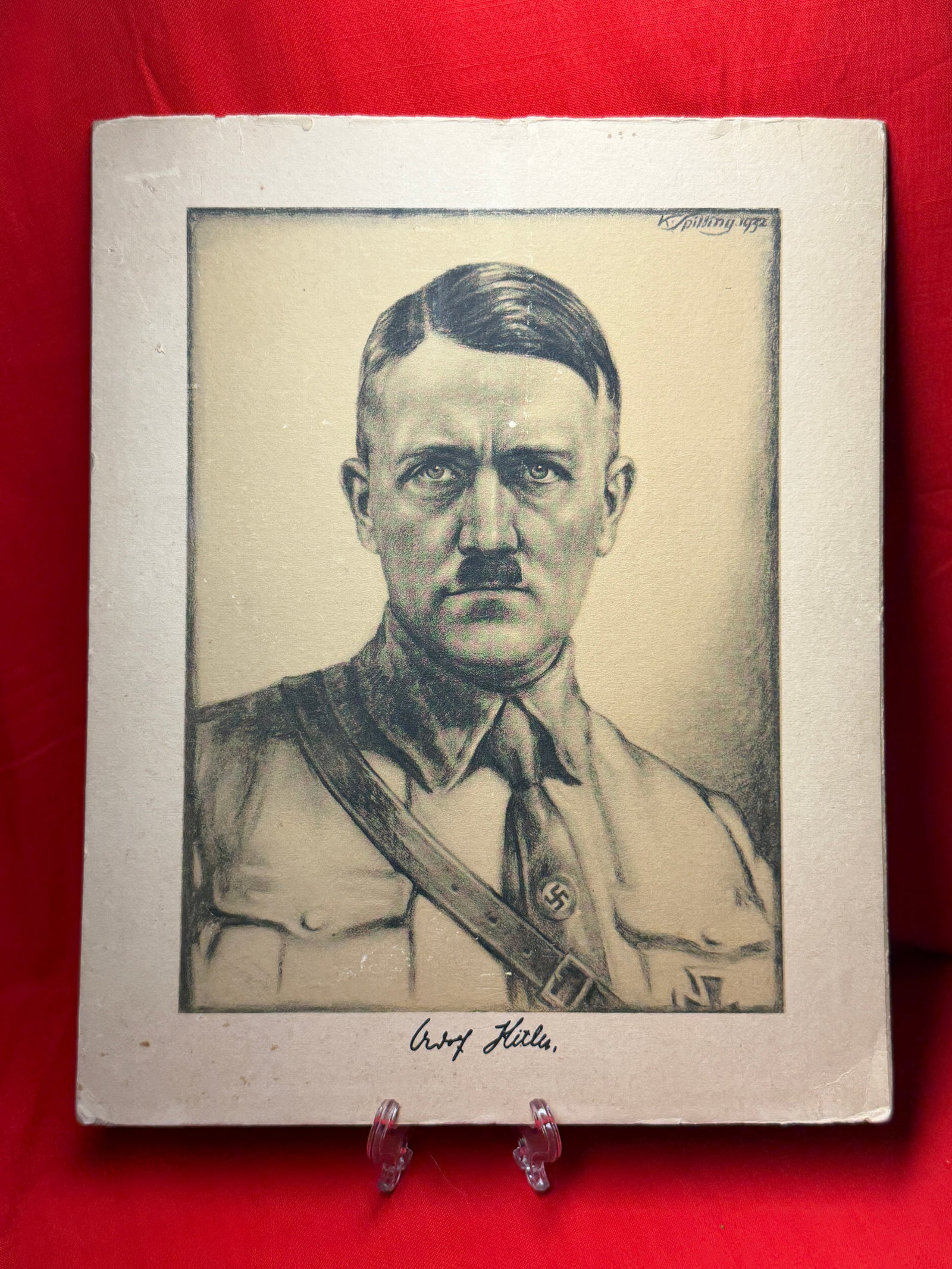 WW2 German Original Portrait Print of Adolf Hitler, Signed and Dated 1932: Portrait print depicts Adolf Hitler, produced during the early rise of National Socialism in Germany. The image, signed by the artist “K. Spilning” and dated 1932, presents Hitler in a formal,