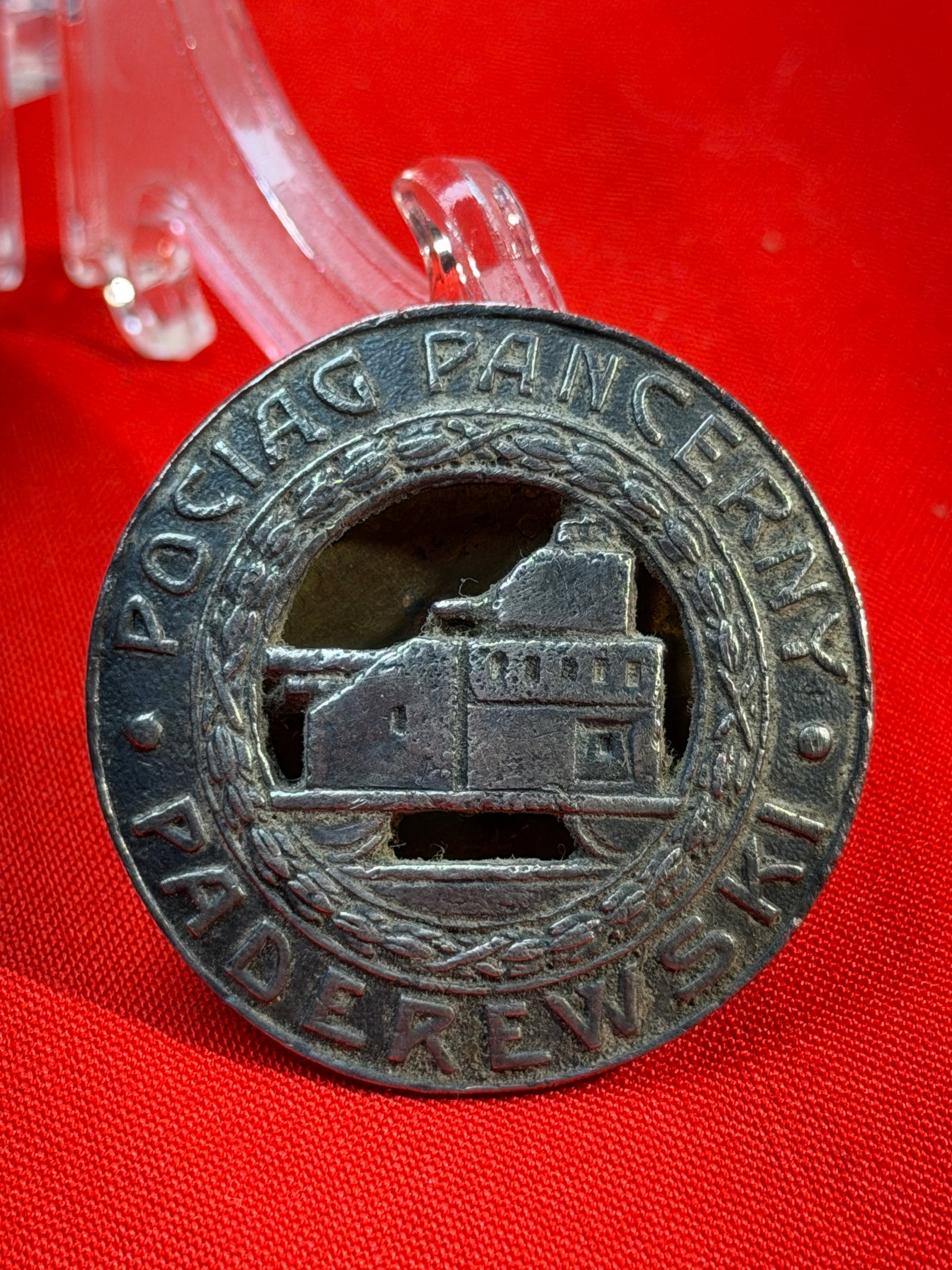 WW2 German Polish Armored Weapons Badge ("Poci?g Pancerny"), Warsaw Manufacture: This circular metal badge depicts an armored train—poci?g pancerny—encircled by a laurel wreath and the Polish inscription “POCI?G PANCERNY” (“Armored Train”). Armored trains playe