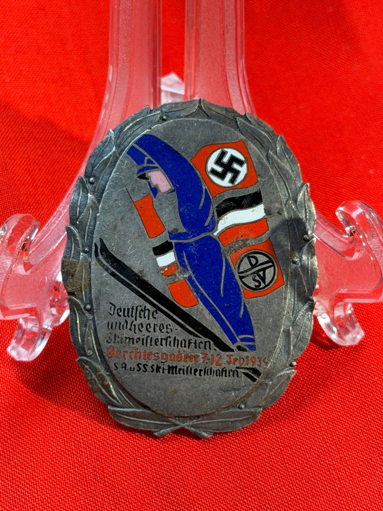 WW2 German SA/SS Ski Championship Badge, Berchtesgaden, December 7, 1934: This enameled commemorative badge was issued for the “Deutsche und Heeres Ski-Meisterschaften” (German and Army Ski Championships) held in Berchtesgaden on December 7, 1934. The design feature