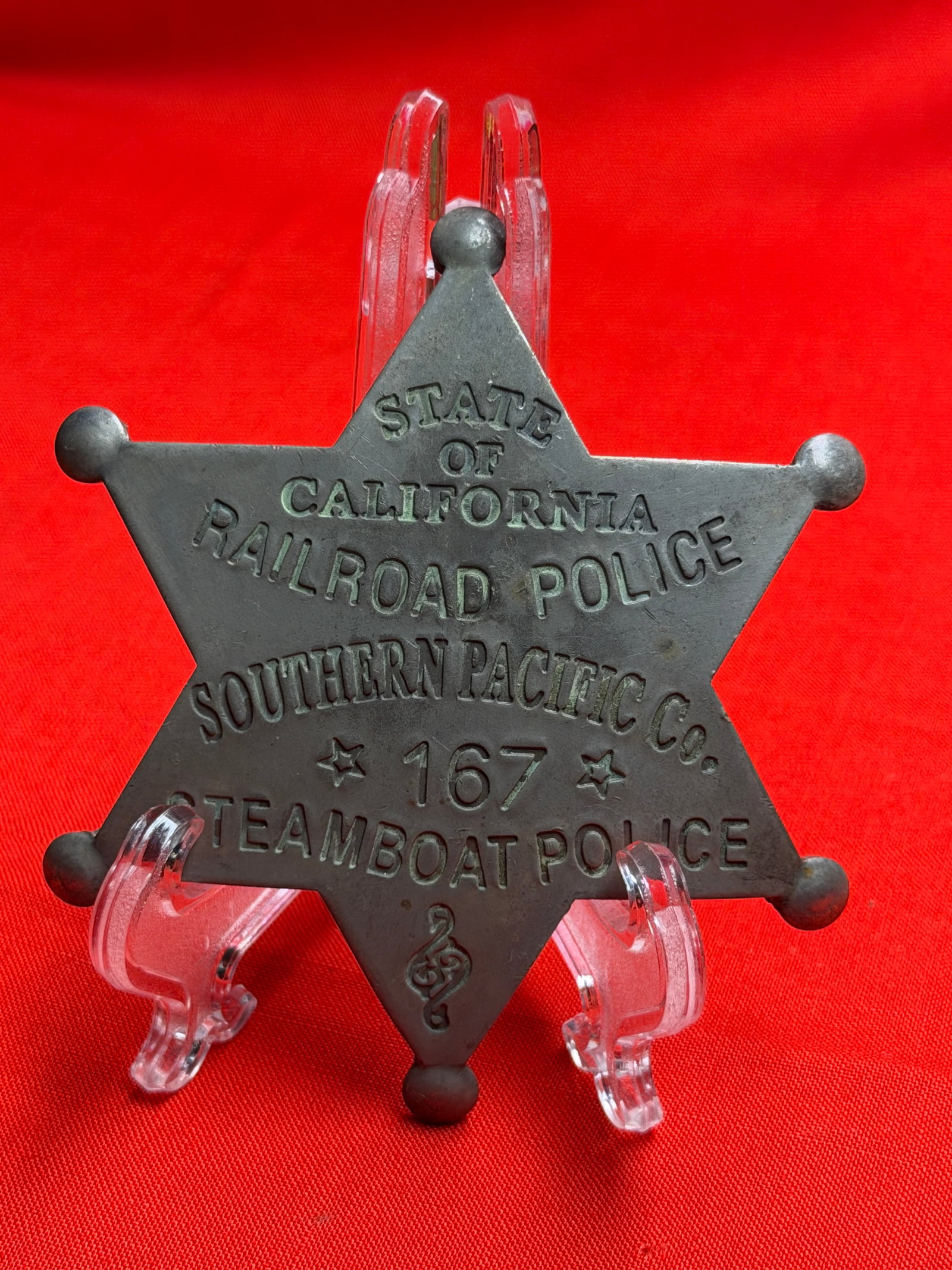 Antique Style Southern Pacific Railroad Police Badge #167 – California Railroad Police Star: Vintage Southern Pacific Railroad Police badge marked: “STATE OF CALIFORNIA / RAILROAD POLICE / SOUTHERN PACIFIC CO. / 167 / STEAMBOAT POLICE” This large six-point star badge represents railro