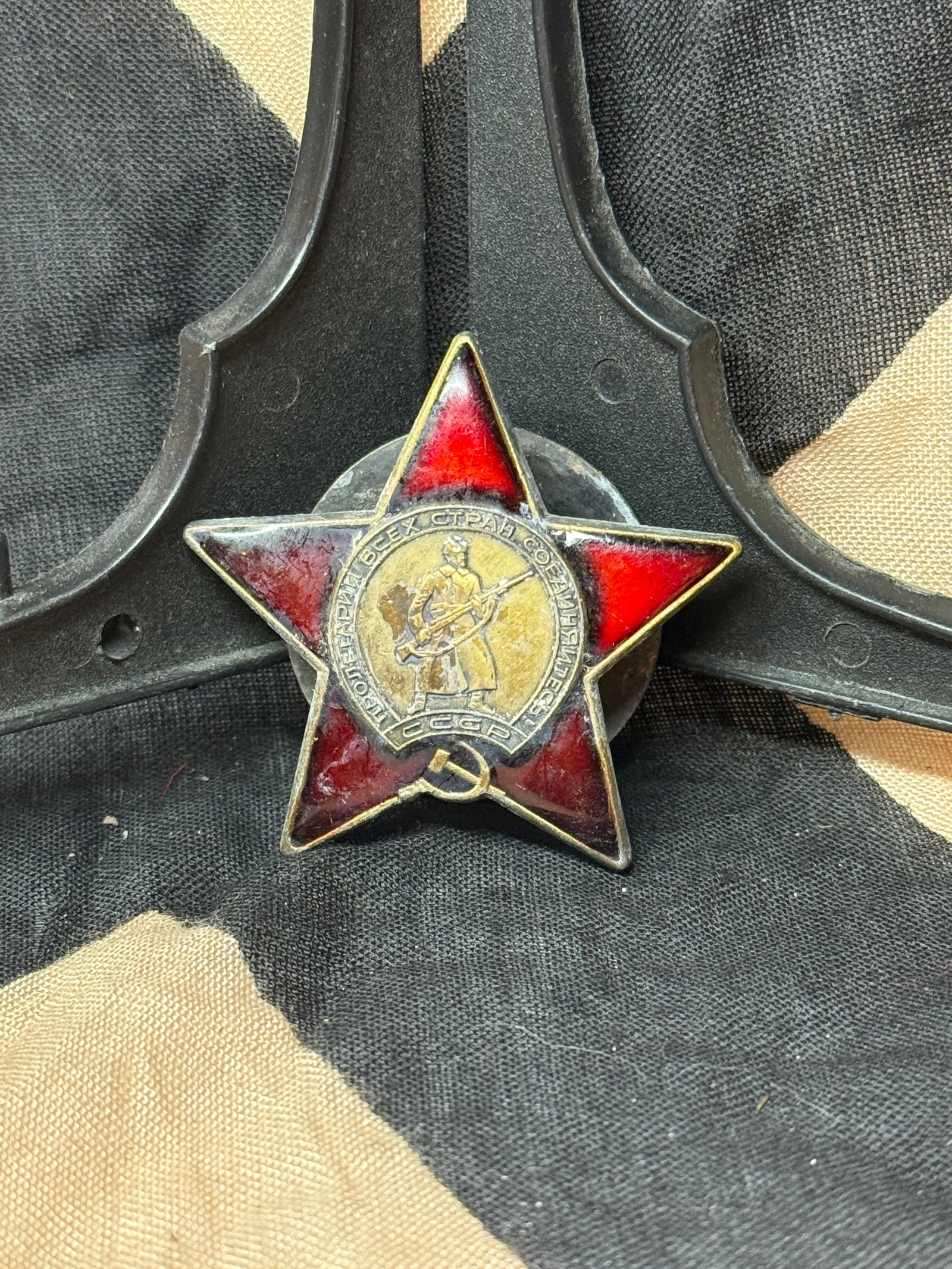 WWII Soviet Order of the Red Star Medal: This five-pointed red enamel medal is the Order of the Red Star, one of the Soviet Union’s most recognized military decorations of World War II. Awarded for personal bravery, leadership, or exceptio
