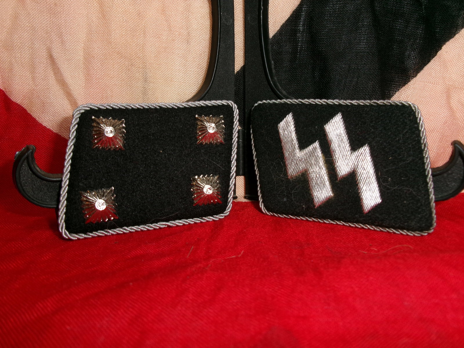 WWII German Waffen-SS Officer Collar Tab Set (Embroidered Runes and Rank Pips) With RZM Paper Tag: This matched pair of Waffen-SS collar tabs represents an officer-grade insignia set from the Second World War. The right-hand tab features the iconic SS “Sig” runes embroidered in silver threa