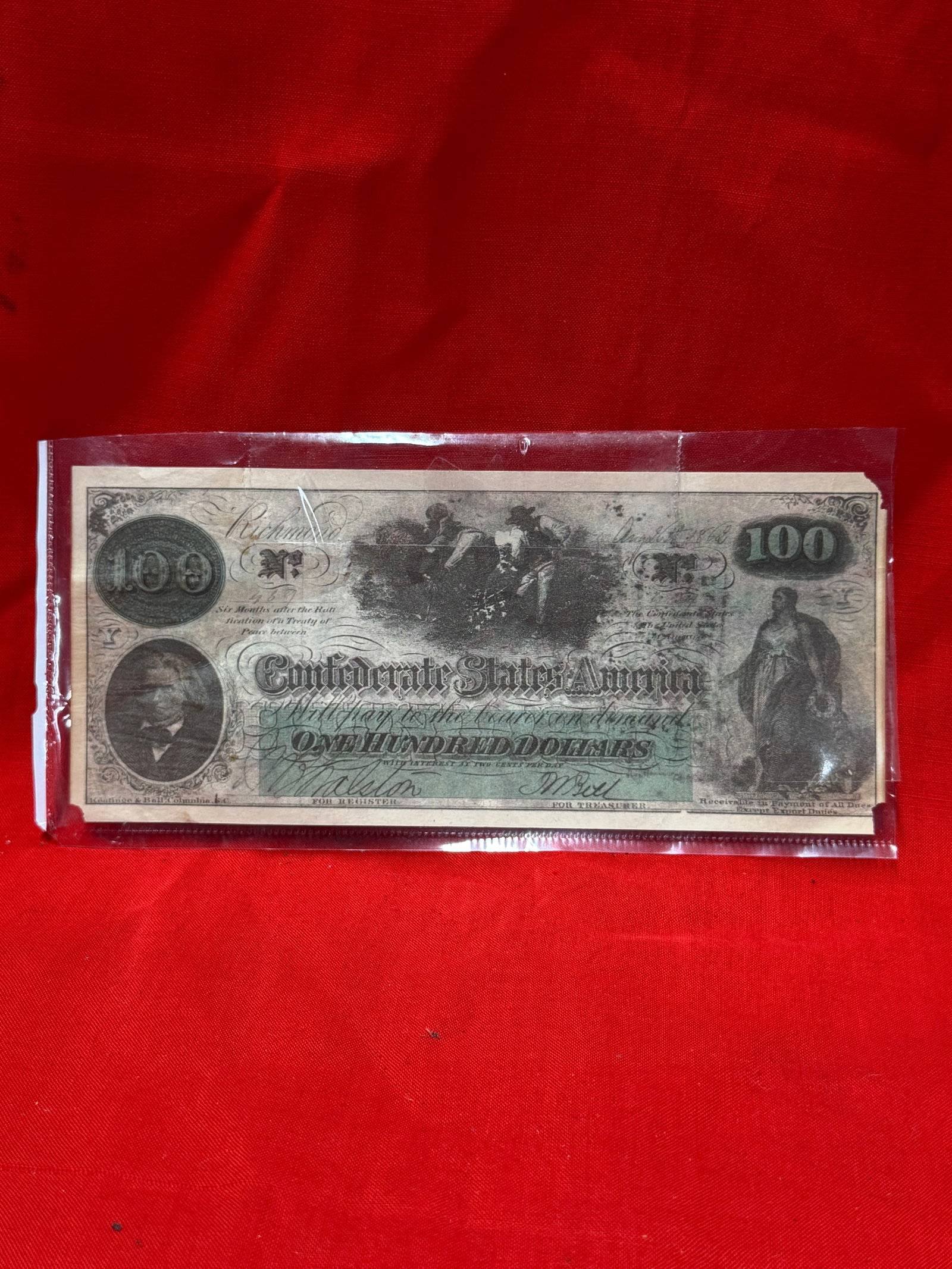 Civil War Confederate States of America $100 Style Historical Collectible Note Display Piece: Historical-style Confederate States of America $100 denomination collectible display note featuring detailed period-inspired artwork, ornate engraving, and classic Civil War-era design elements. In ou