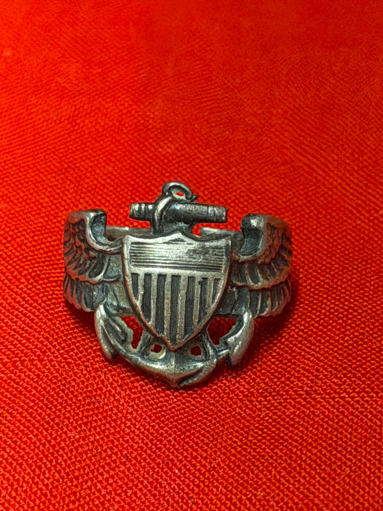 WW2 U.S. Navy Sterling Silver Eagle Shield Anchor Military Ring: World War II era U.S. Navy sterling silver ring featuring an eagle, shield, and anchor military emblem design. In our opinion, this piece dates to the WW2 period and was likely worn as a patriotic or 