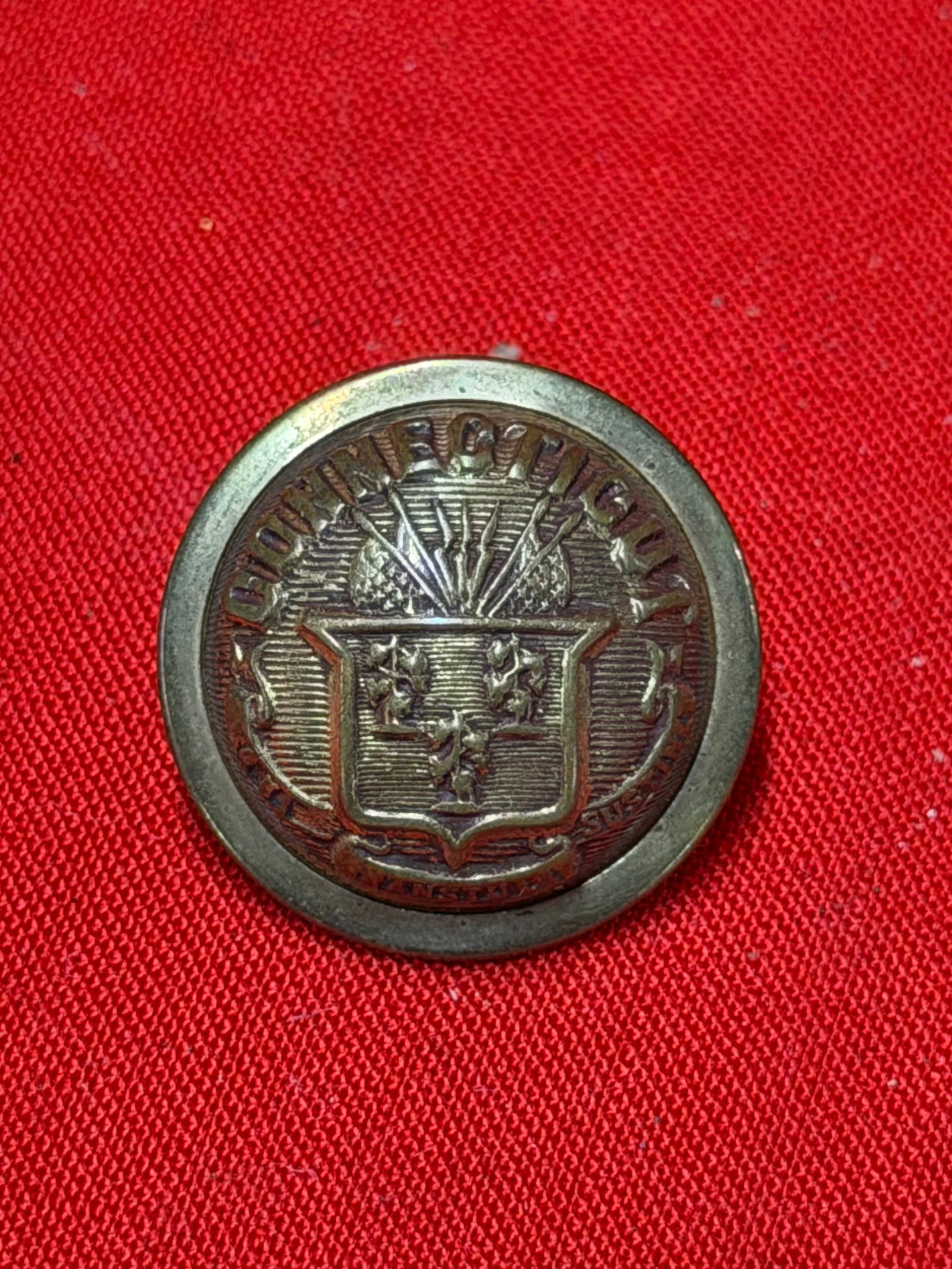 Civil War Era Connecticut Uniform Coat Button Waterbury Backmark: Civil War era Connecticut uniform coat button featuring an ornate raised Connecticut state-style crest design with surrounding “CONNECTICUT” lettering. Reverse is marked “WATERBURY,” i