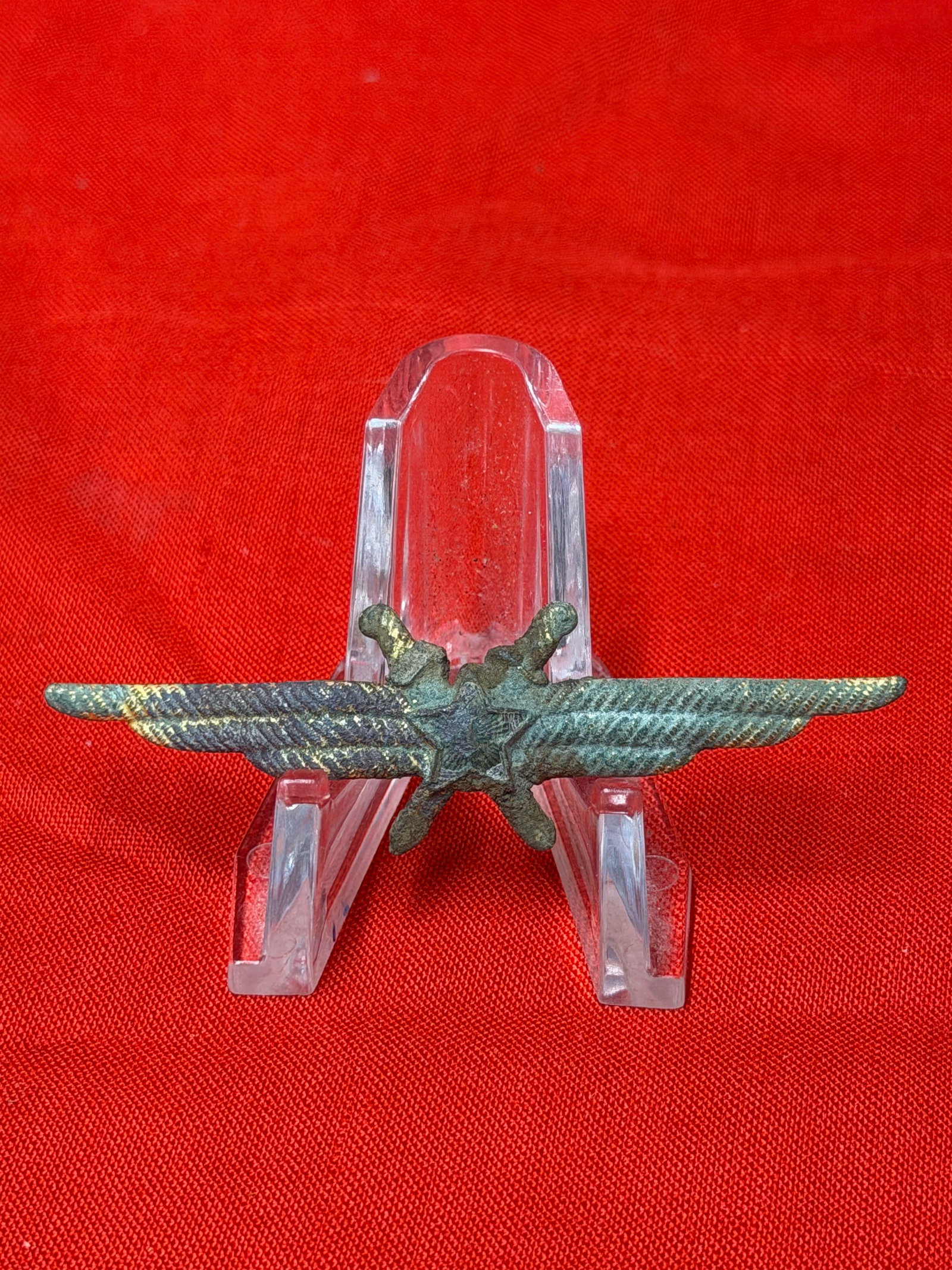 WWII German Luftwaffe / Fallschirmjäger Style Winged Dagger Badge Pin – Military Insignia: WWII-era German military-style winged insignia badge featuring a central star with crossed dagger/sword motif and extended feathered wings. The piece displays classic Luftwaffe or Fallschirmjäger-ins