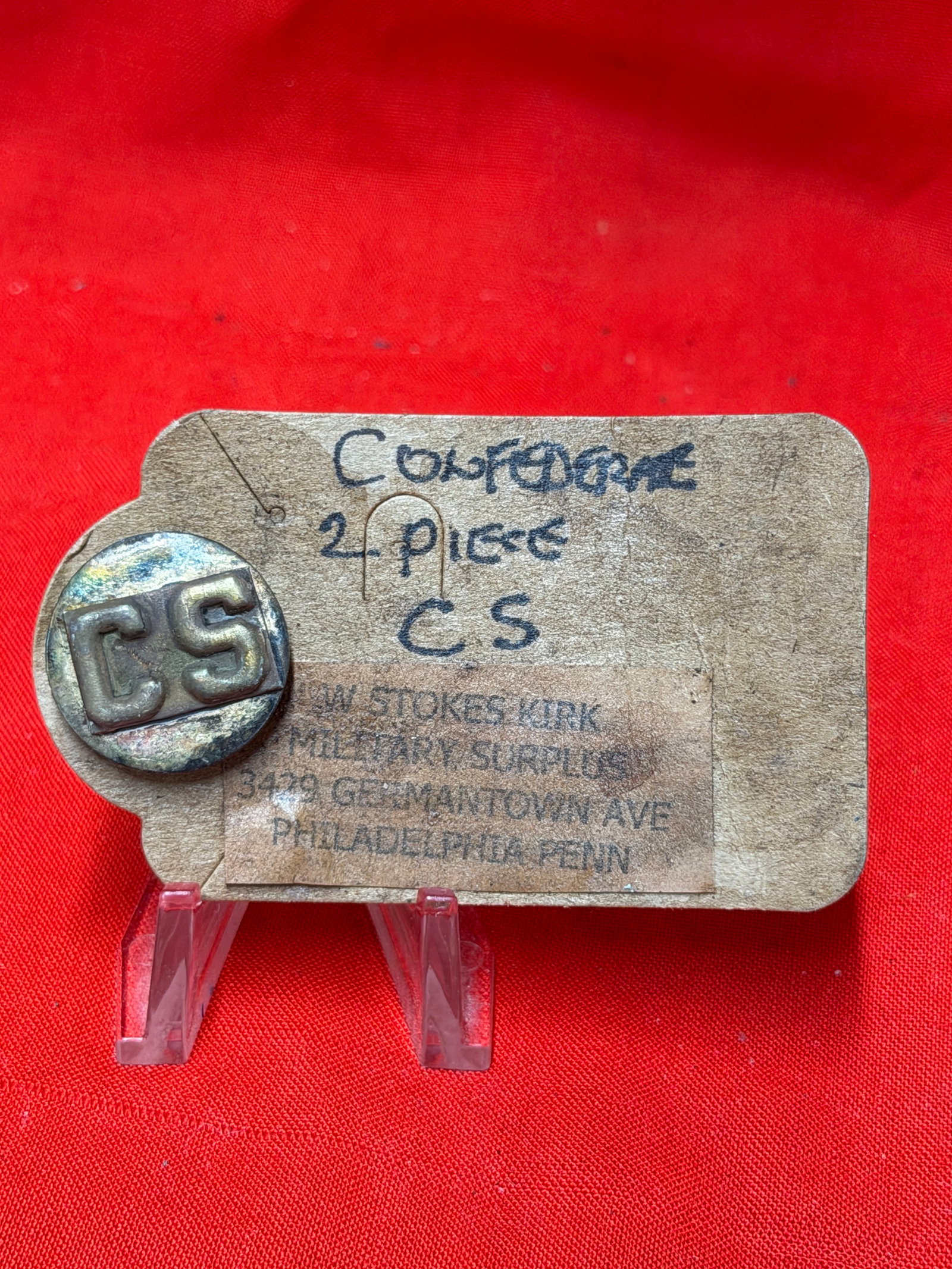 Confederate States “CS?? Two Piece Uniform Button Civil War Era Style By W. Stokes Kirk: Vintage two piece “CS” uniform button featuring raised Confederate States initials on a domed circular face. Brass tone construction with aged patina and surface wear consistent with age and s