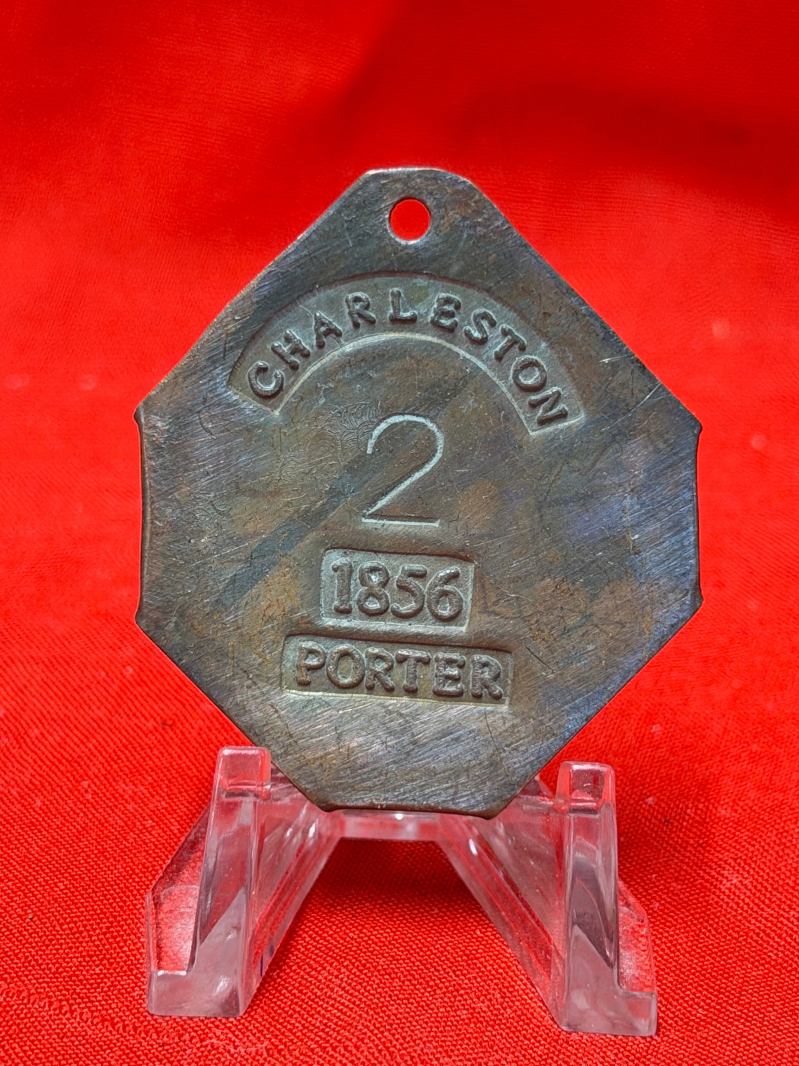 Charleston 1856 Porter Slave Tag No. 2 Antique Badge: In our opinion, this Charleston porter slave tag marked “1856” and number “2” is an outstanding historical occupational badge associated with Charleston’s slave hire system. Features