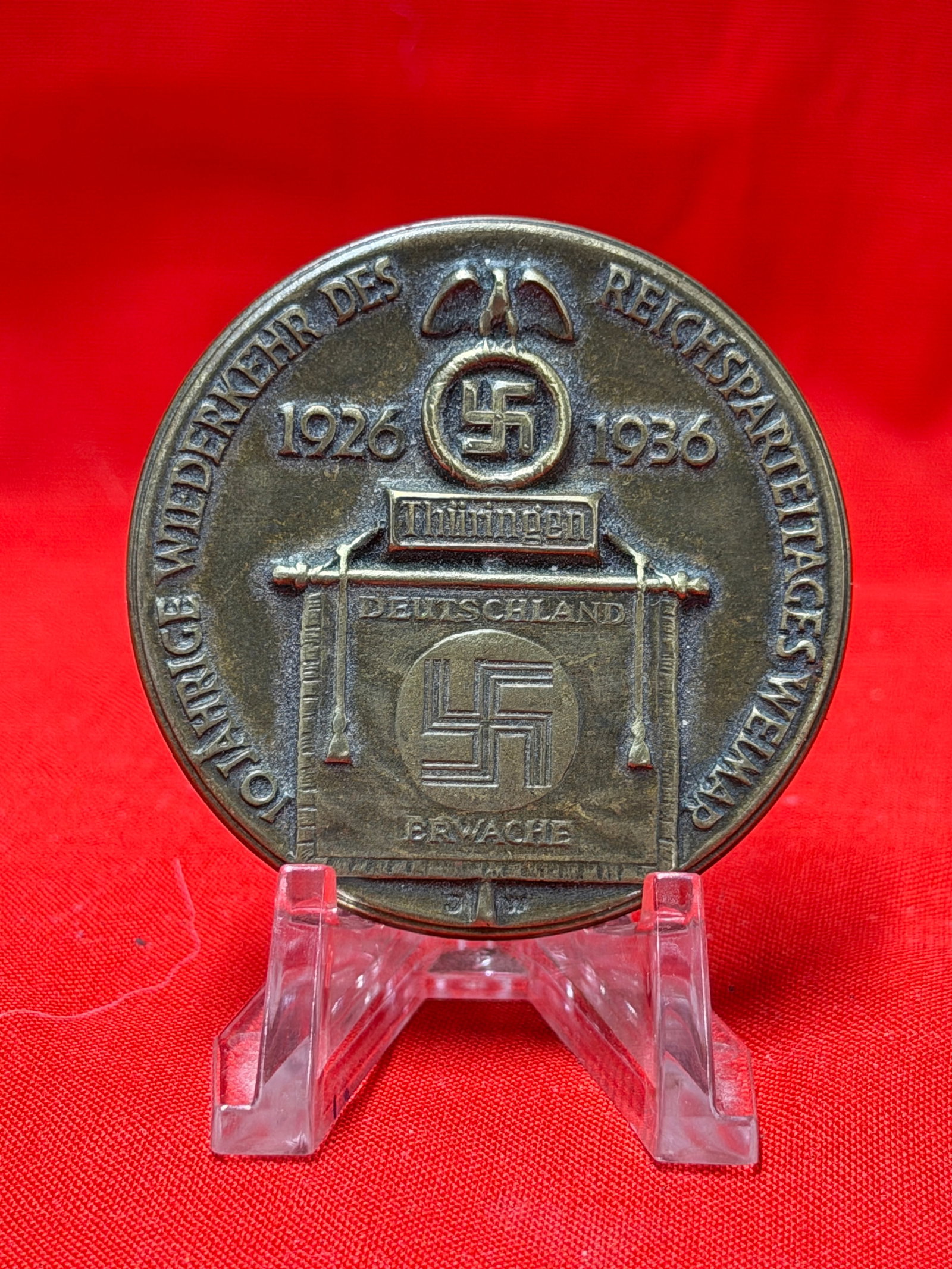 German NSDAP 1926-1936 Tinnie Badge Thüringen Gau Meeting Medal Pin: In our opinion, this German political commemorative tinnie badge dates to the 1930s and commemorates the “10 Jahre Wiederkehr Des Reichsparteitages Weimar 1926-1936” event in Thüringen. The f