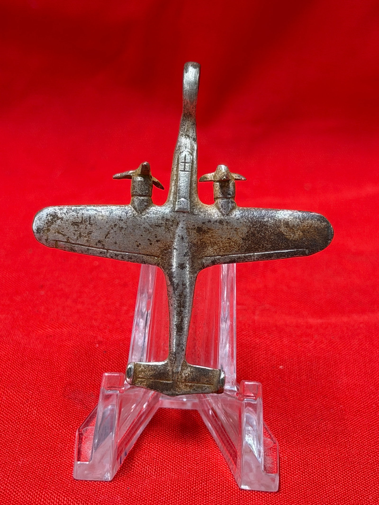 WWII German Luftwaffe Glider Pilot Aircraft Pendant D.R.G.M. Marked: WWII German Luftwaffe glider pilot aircraft pendant featuring a detailed twin engine aircraft design with suspension loop and visible D.R.G.M. marking on the fuselage. In our opinion this piece repres