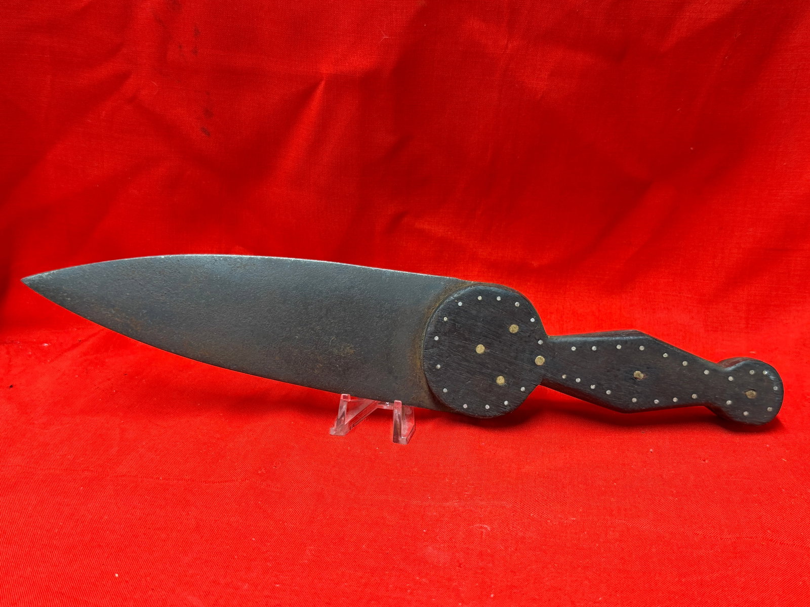 1800s Native American Hudson Bay Trade Dag Knife Dagger: Native American Hudson Bay trade dag knife features a wide spear point iron blade with a carved dark wood handle accented by brass pin decoration throughout. The knife measures approximately 12 inches