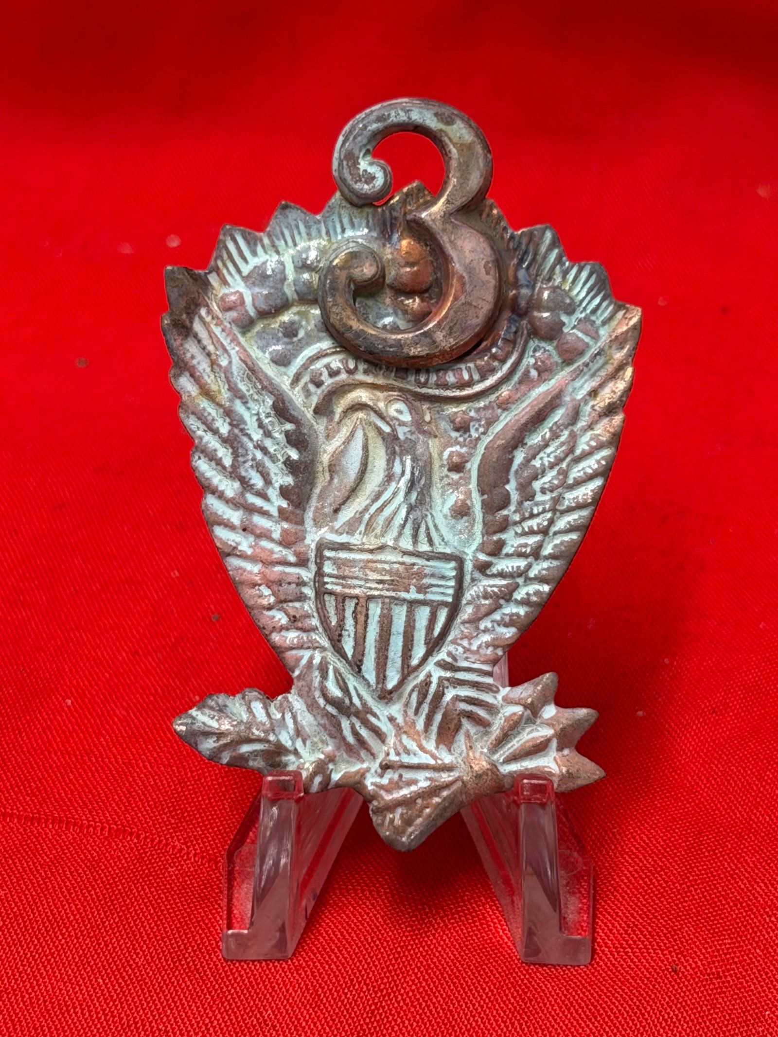 Civil War Era Jeff Davis Hardee Hat Side Eagle Division 3 Insignia: Civil War era hat insignia featuring eagle with shield and banner motif associated with Jeff Davis Hardee hat side emblems and Division 3 identification. In our opinion this piece dates to the mid to 