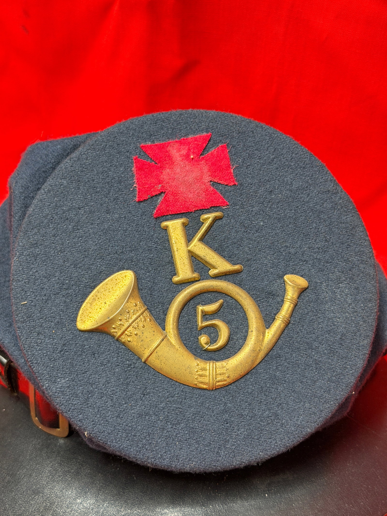 Civil War Era K5 Unit Infantry Bugle Corps Bummers Cap Kepi Hat: Civil War era style K5 infantry bugle corps forage cap / kepi featuring brass horn insignia with “K” and “5” markings along with red cross patch on front. Dark blue wool body with blac