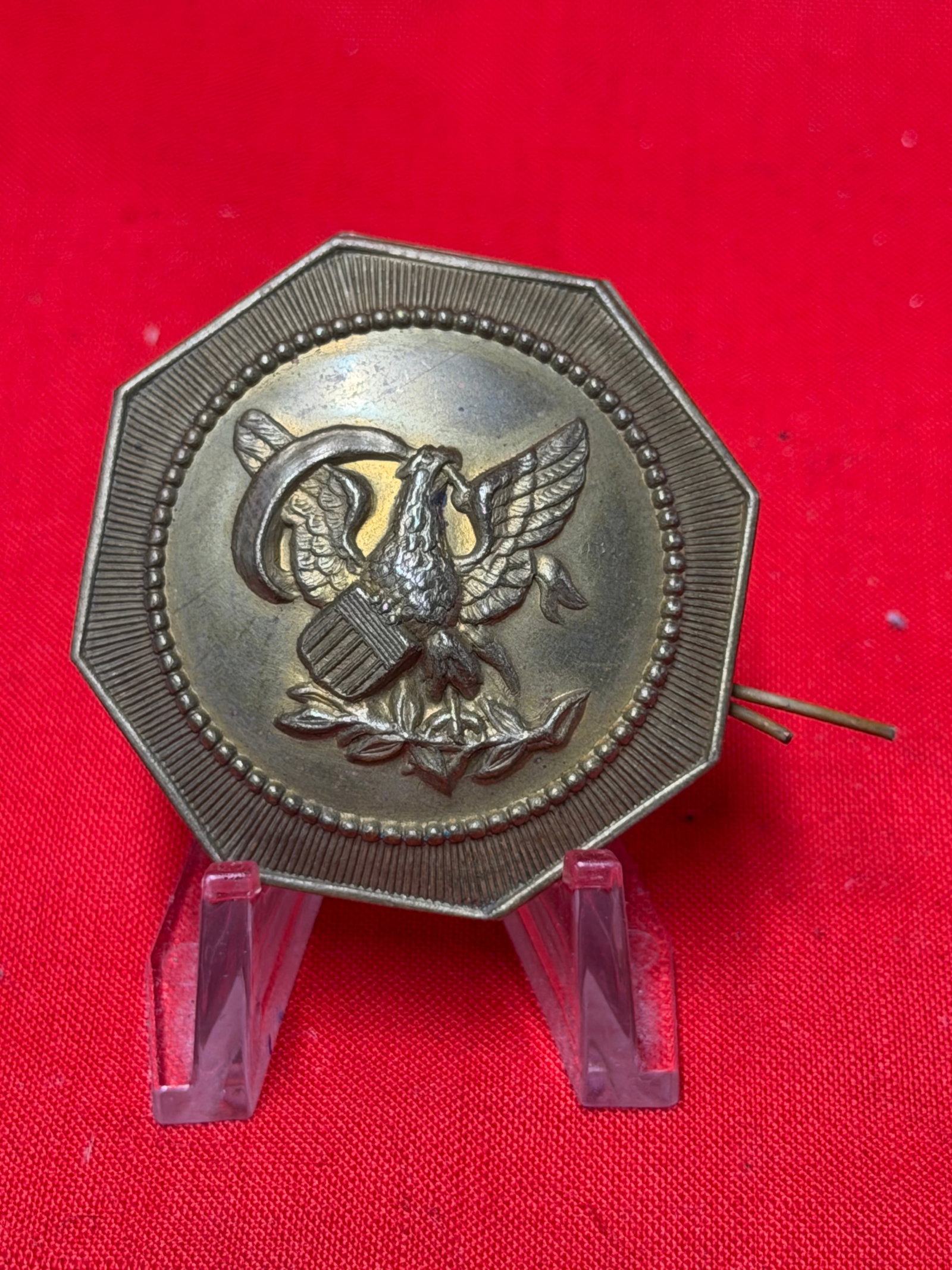 Civil War Era Eagle Breast Plate Rosette Pin Military Uniform Insignia Display Piece: Octagonal military insignia pin featuring raised federal eagle with shield, olive branch, and arrows motif on front. In our opinion this piece represents a Civil War era patriotic or military related 