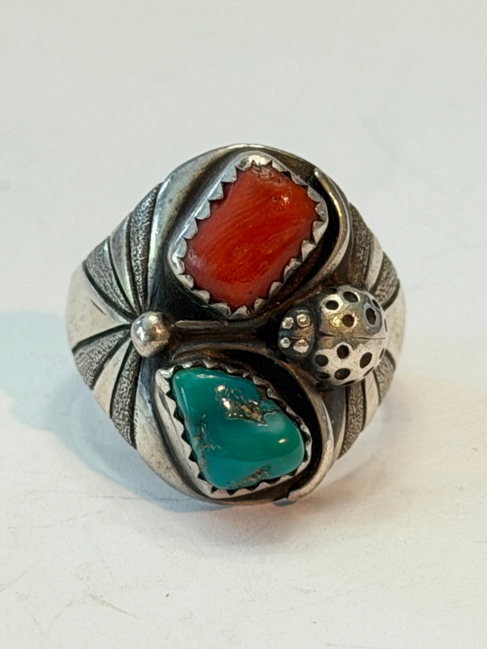 Vintage Sterling Silver Coral & Turquoise Ring Size 7 Southwestern Artisan Statement Ring: Vintage sterling silver Southwestern style statement ring featuring natural red coral and turquoise stones in hand-cut serrated bezel settings. The bold asymmetrical design includes detailed silverwor