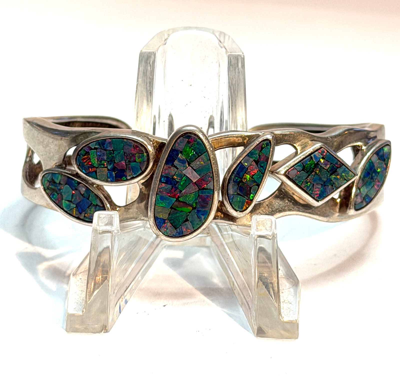 Sterling Silver Mosaic Opal Inlay Cuff Bracelet WK 925 Mexico Fire Opal Style: Beautiful vintage sterling silver cuff bracelet featuring colorful mosaic opal inlay stones in multiple geometric shapes. This eye-catching bracelet displays vivid flashes of blue, green, red, and pur
