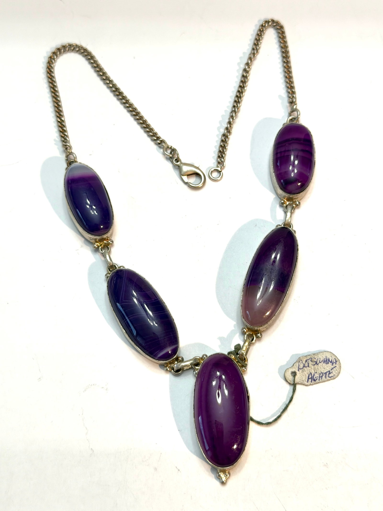 Botswana Agate Sterling Silver Statement Necklace Purple Banded Agate Cabochons: Beautiful vintage sterling silver statement necklace featuring five polished Botswana agate cabochons in rich shades of purple and lavender with natural banding throughout. Each elongated oval stone i
