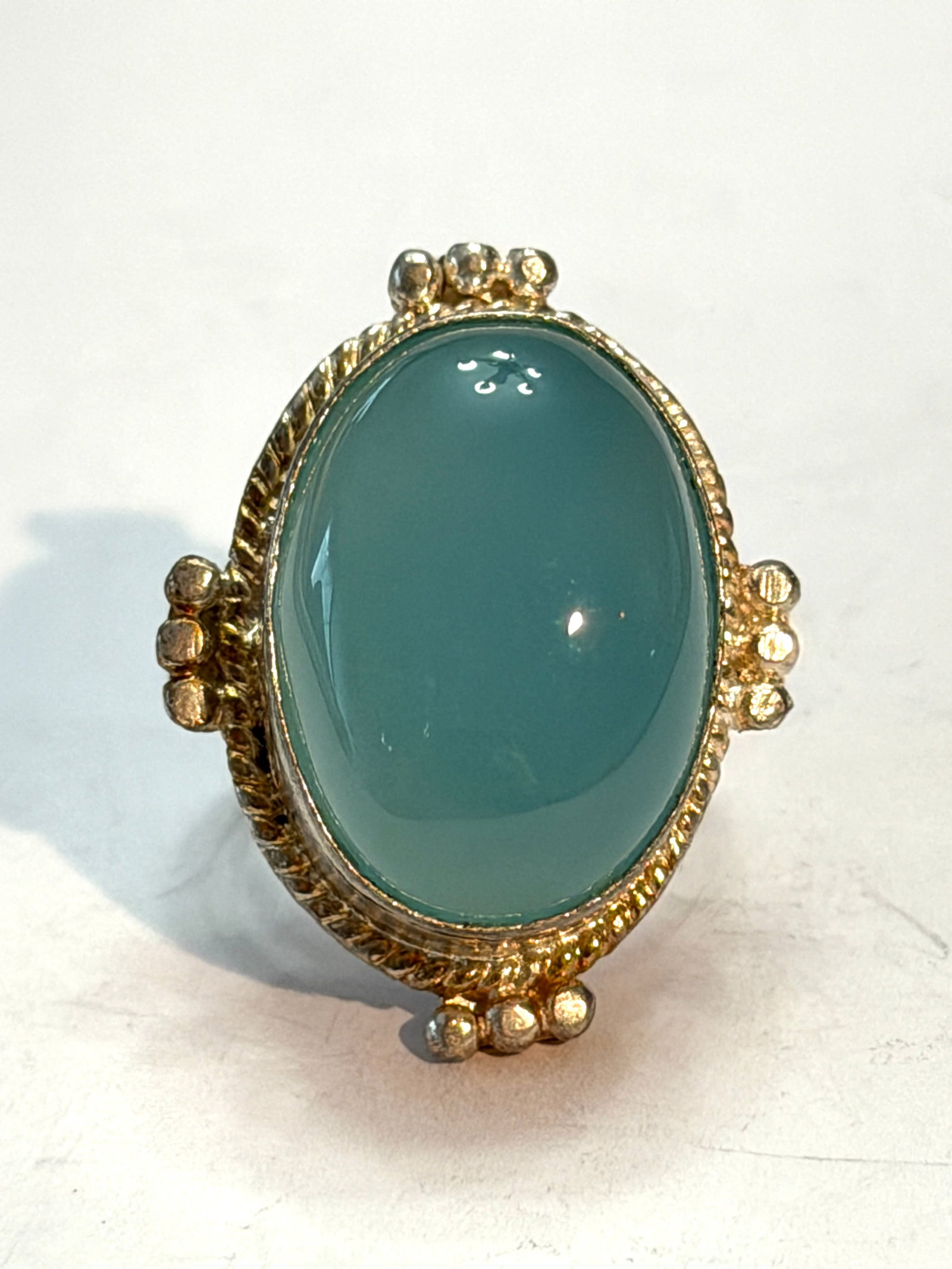 Vintage Sterling Silver Aqua Chalcedony Cabochon Statement Ring Boho Artisan Ring: Beautiful vintage sterling silver statement ring featuring a large oval aqua chalcedony cabochon in a decorative handcrafted setting with rope-edge detailing and bead accents. The soft seafoam blue st
