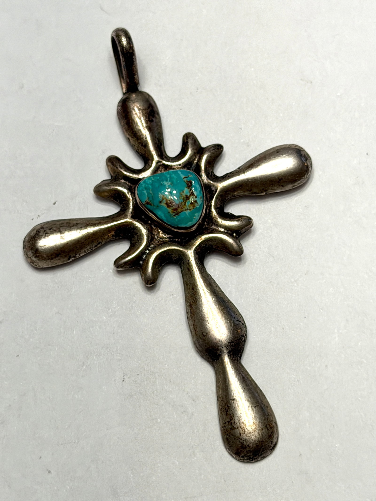 Southwestern Sterling Silver Turquoise Cross Pendant Native Style Statement Charm: Vintage Southwestern style cross pendant featuring a natural turquoise center stone set in a bold organic silver-tone cross design. The sculptural form and rustic finish give this piece a strong handm