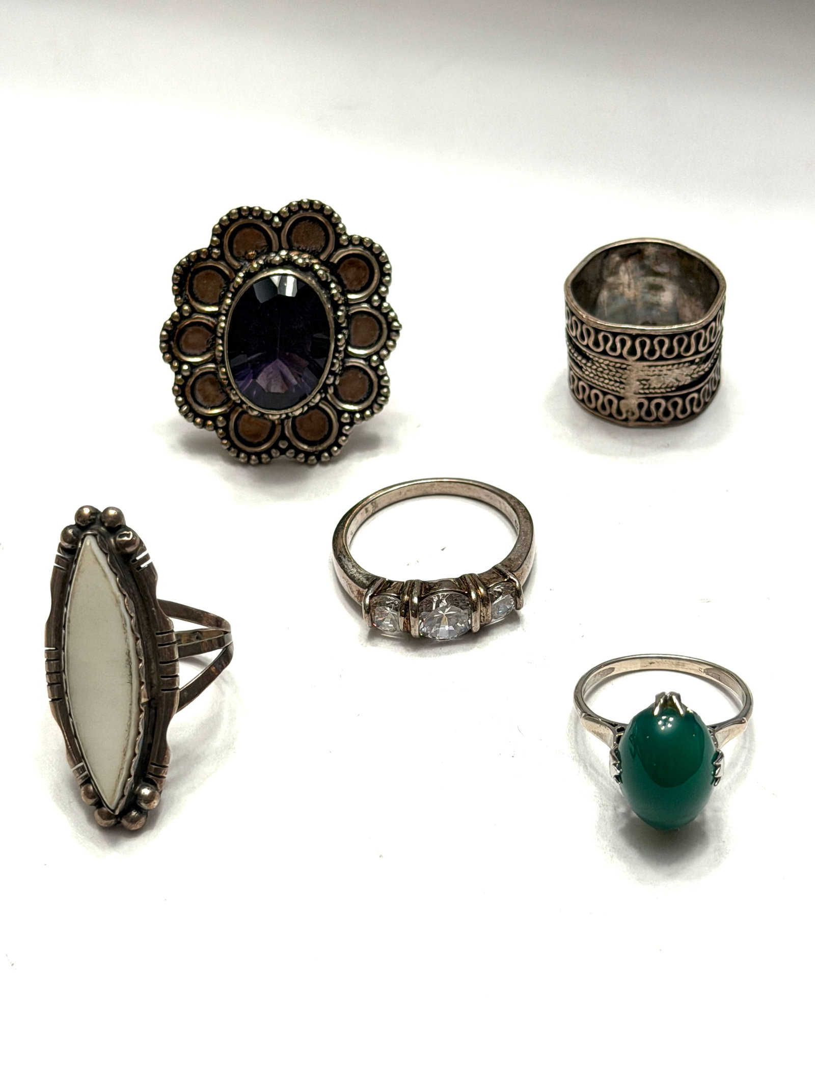 Sterling Silver Ring Lot Art Deco Southwestern Amethyst Green Stone CZ Statement Rings: Beautiful vintage ring collection featuring five unique sterling silver rings in a mix of Art Deco, Southwestern, and classic statement styles. Includes a large faceted purple stone floral ring, ornat