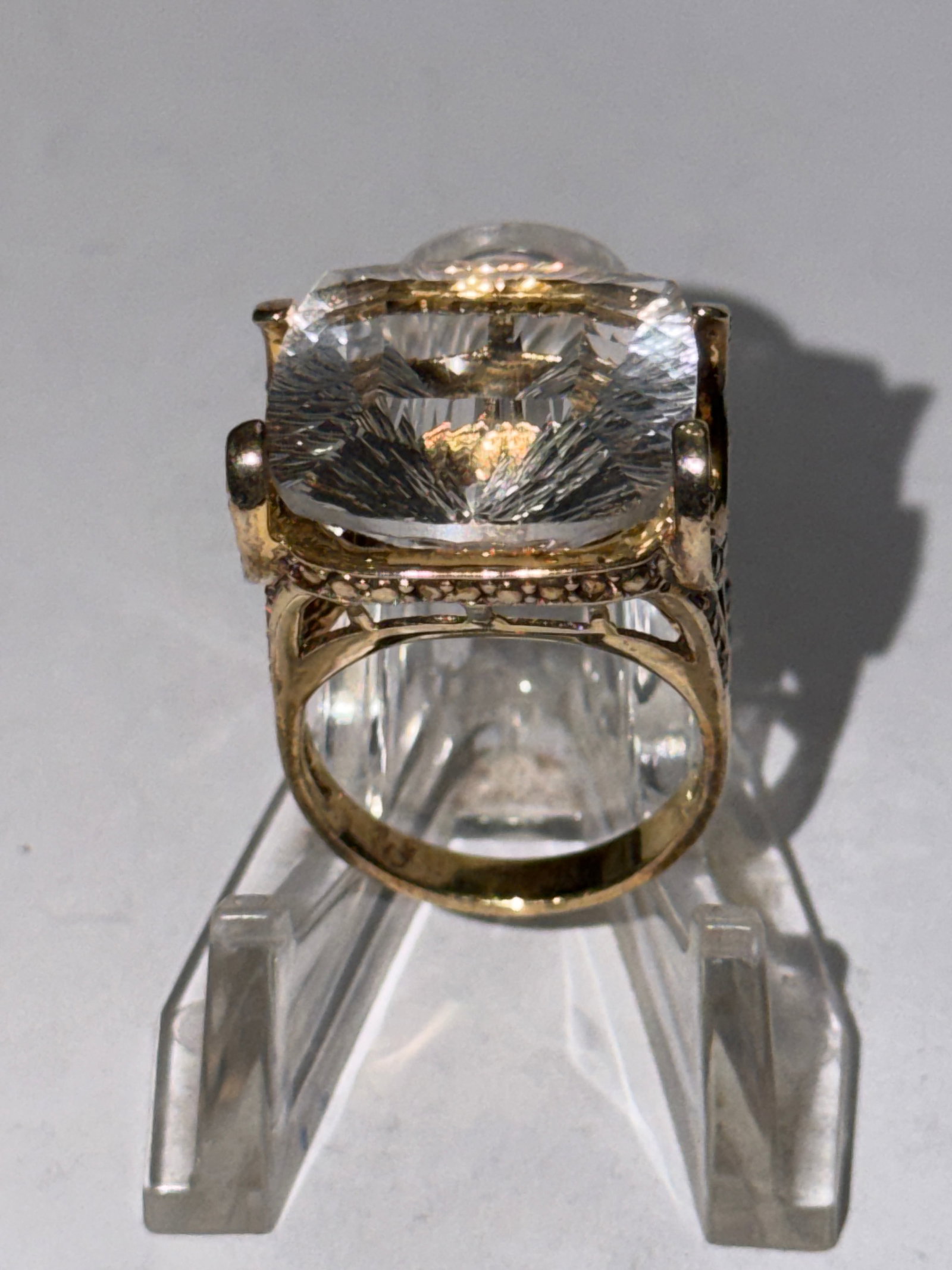 Sterling Silver Gold Tone Statement Ring Large Clear Faceted Crystal Cocktail Ring: Striking vintage sterling silver statement ring with gold tone finish featuring an oversized rectangular cushion-cut clear faceted crystal in an ornate openwork setting with rhinestone accented should