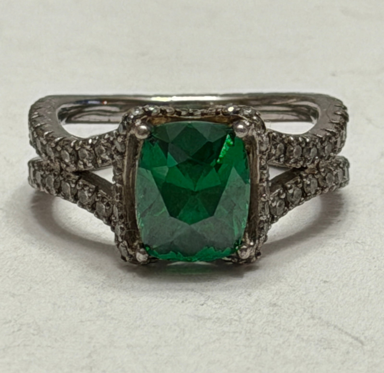 Vintage Emerald Green Cocktail Ring Split Shank Pav? Style Statement Ring Size 9: Elegant vintage style statement ring featuring a vivid emerald green cushion cut center stone accented with sparkling pavé style clear stones along a dramatic split shank setting. The rich green 