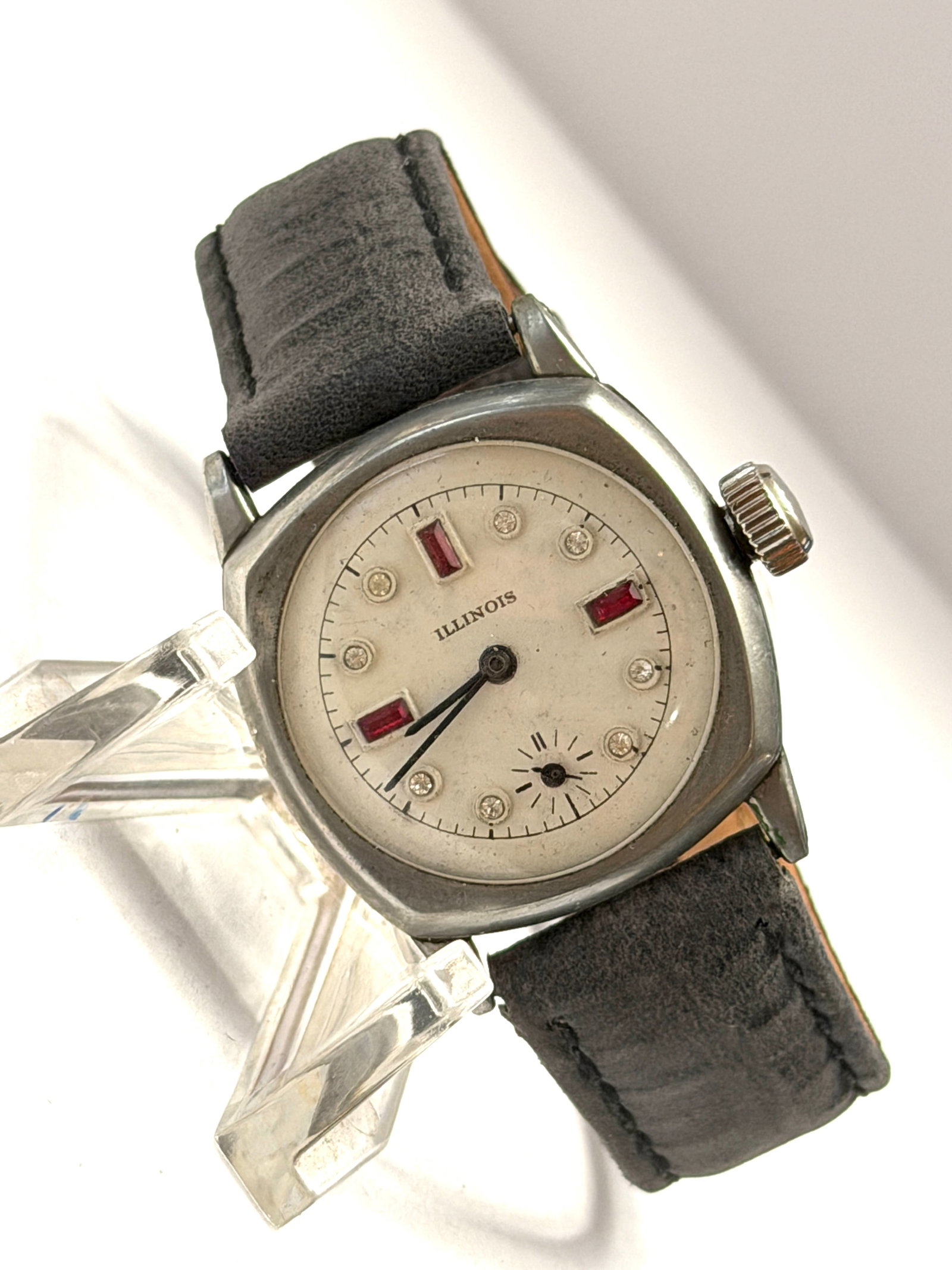 Vintage Illinois Art Deco Style Manual Wind Wristwatch ? Red Gem Dial Accents: Vintage Illinois wristwatch featuring a unique minimalist Art Deco-inspired dial with striking red rectangular hour markers and decorative crystal-style accents. The clean silver-tone dial is paired w