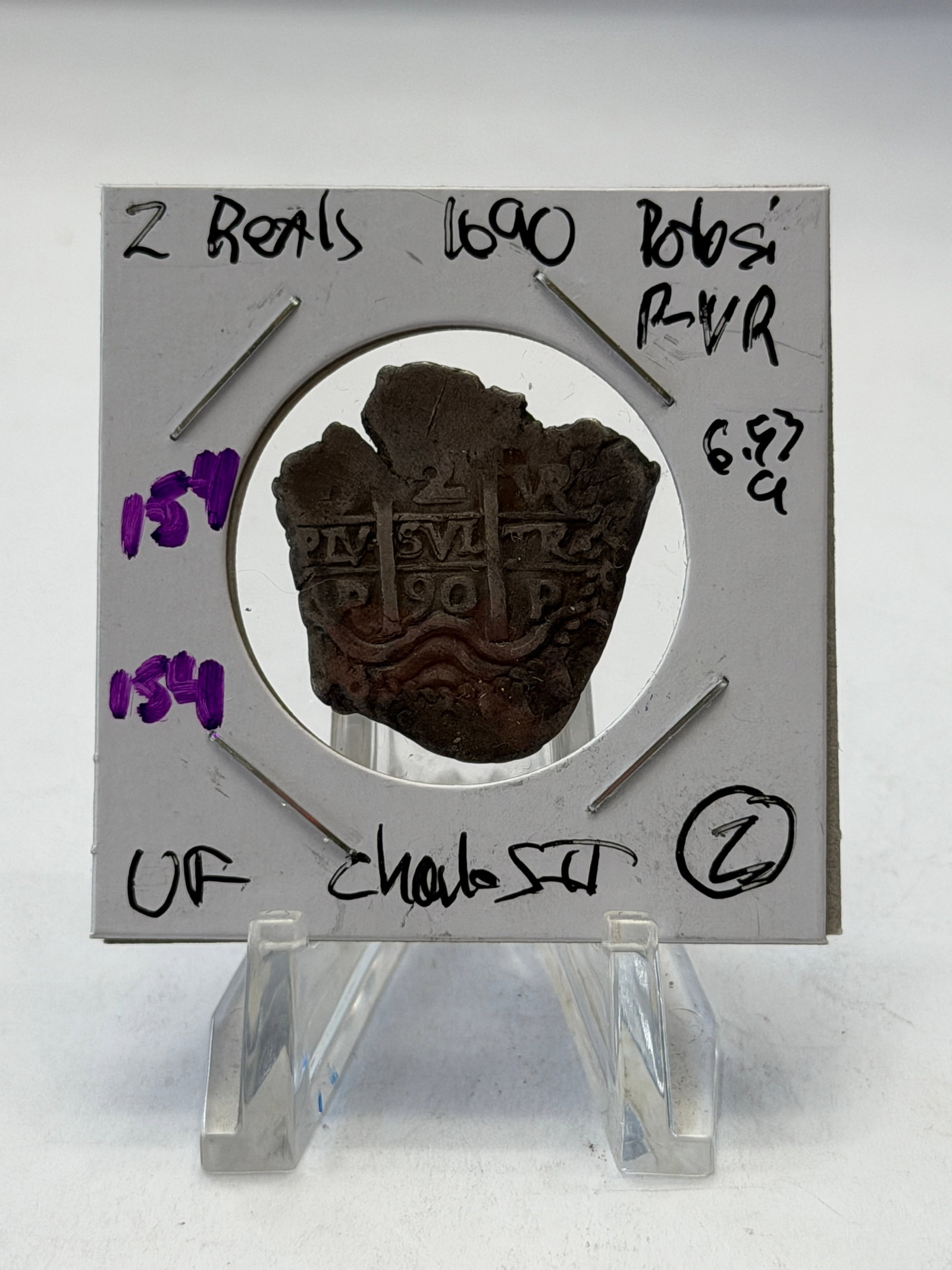 1690 Potos? Silver 2 Reales Cob ? Charles II Spanish Colonial Treasure Coin: Authentic Spanish Colonial silver cob 2 reales struck at the Potosí mint in Bolivia and dated 1690 during the reign of King Charles II of Spain. This hand-struck cob coin represents the classic e