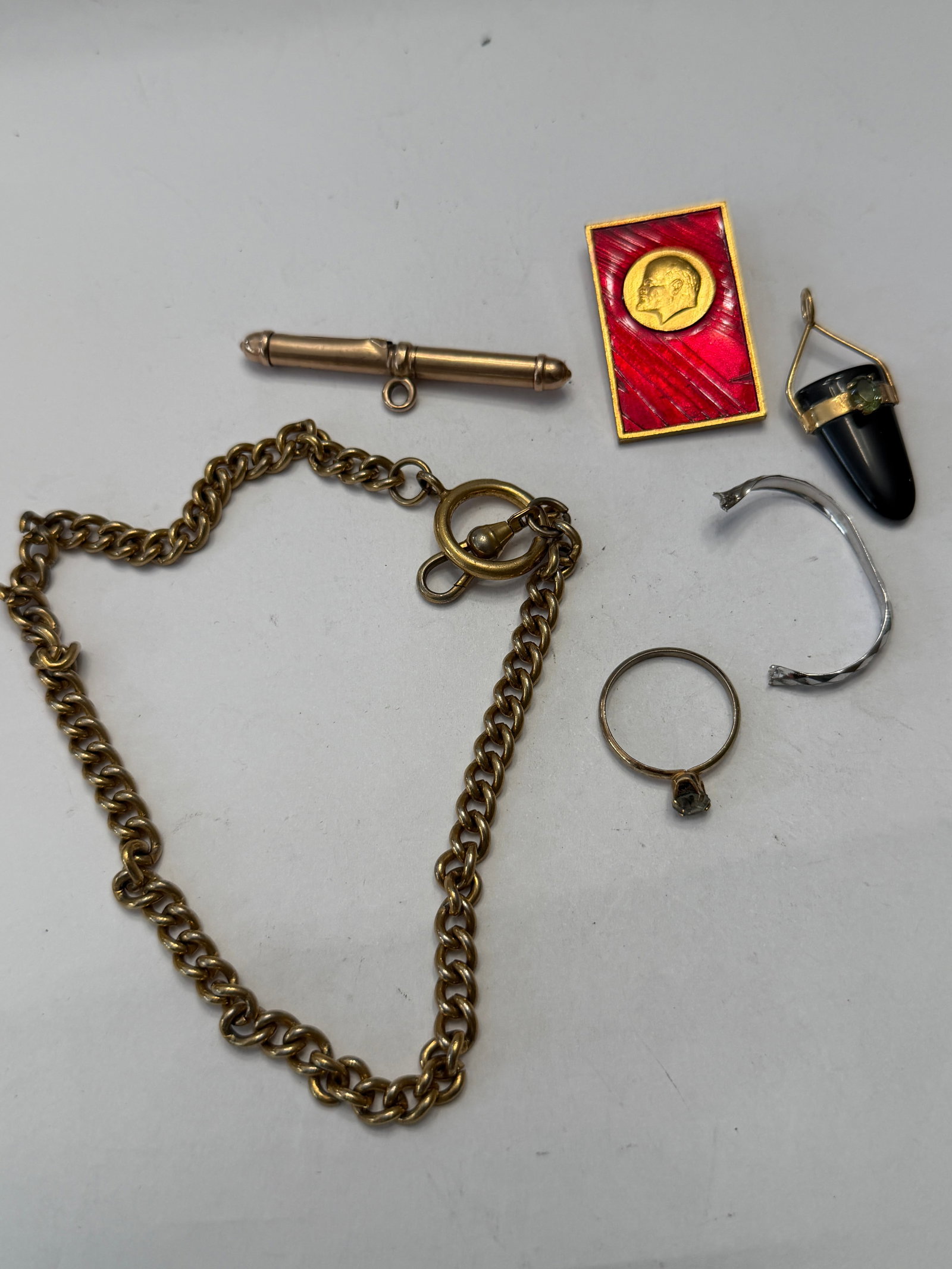 Vintage Mixed Jewelry & Collectibles Lot ? 10K Gold Lenin Pin, Watch Chain, Ring, Pendant &: Interesting mixed vintage jewelry and small collectibles lot featuring several unique pieces, including a marked 10K gold Soviet-era Lenin pin, antique-style watch chain, bullet-shaped pendant/charm, 