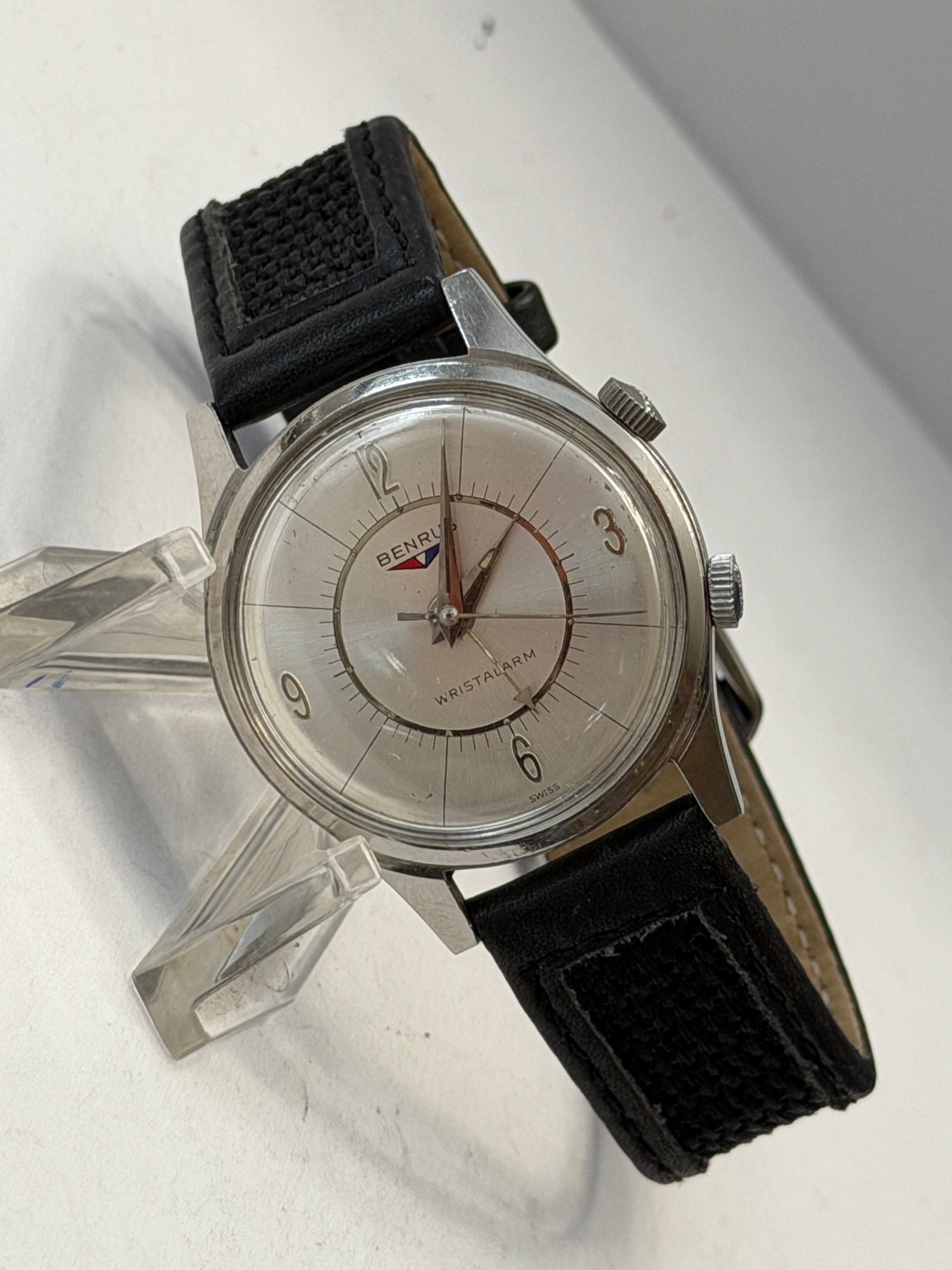 Vintage Benrus Wristalarm Mechanical Alarm Wristwatch: Vintage Benrus Wristalarm mechanical wristwatch featuring a stainless steel case, dual crown design, silver-tone dial, and original alarm function. Dial marked “Wristalarm” with stylized n
