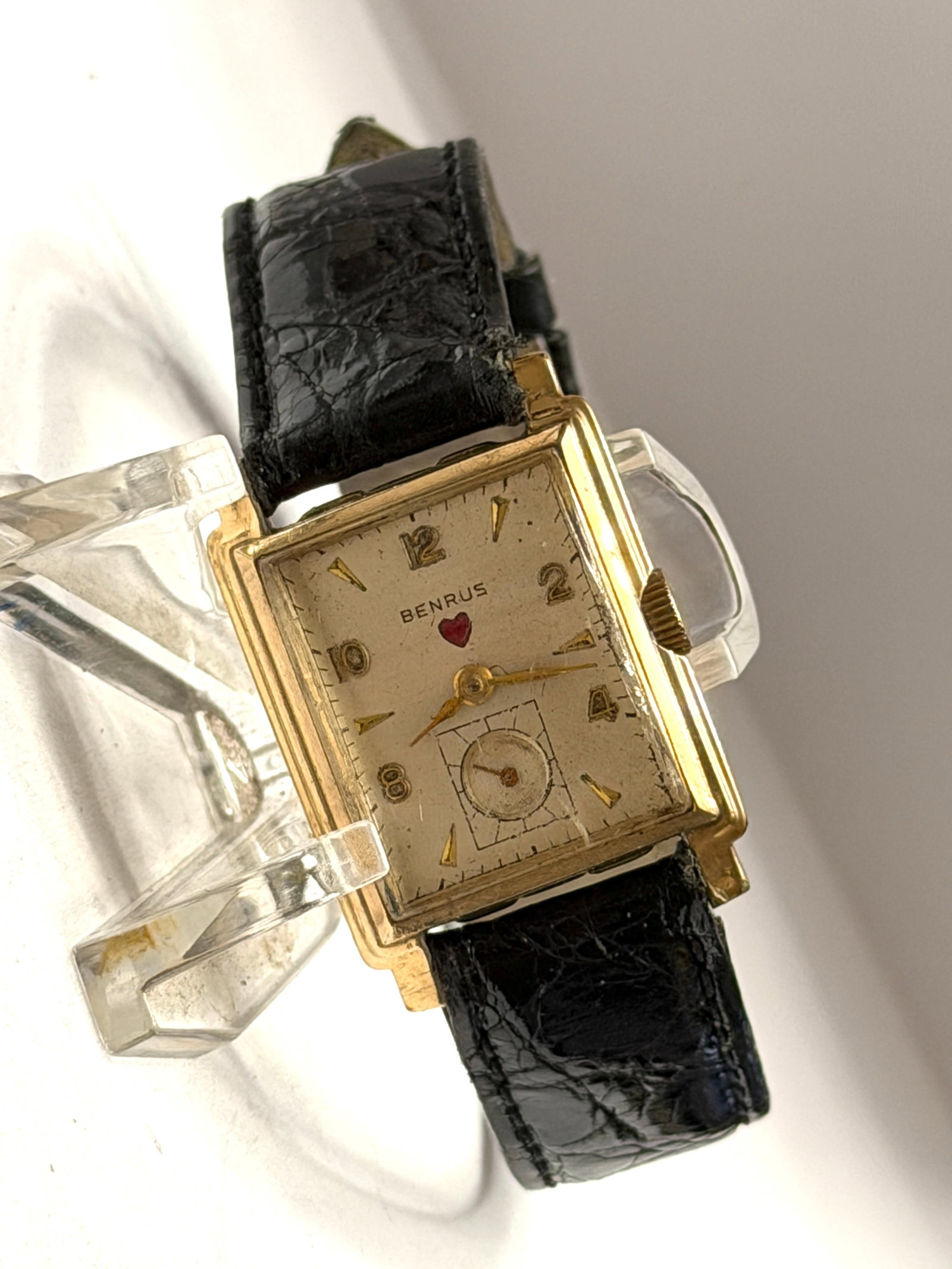 Benrus Rectangular Wristwatch ? 10K Gold Filled ? Personalized Engraved Case ? Art Deco Style: Vintage Benrus rectangular wristwatch featuring a classic Art Deco-inspired design with elegant stepped case details and a distinctive small seconds subdial. The dial displays stylized Arabic numerals