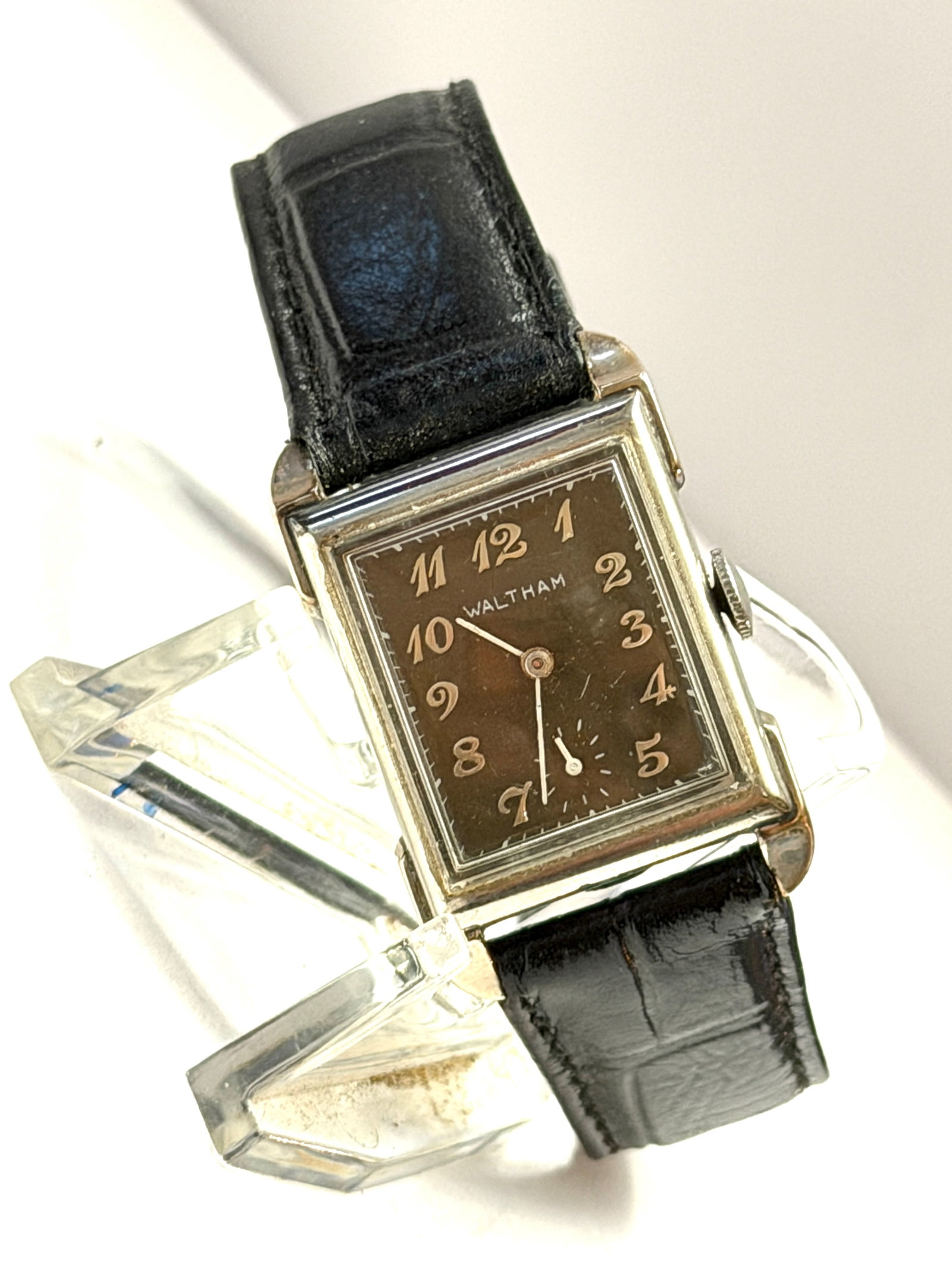 Waltham Rectangular Art Deco Wristwatch ? 10K Gold Filled Manual Wind Watch: Classic vintage Waltham rectangular wristwatch showcasing elegant Art Deco styling and timeless early-to-mid century American watch design. The distinctive black dial features stylized Arabic numerals