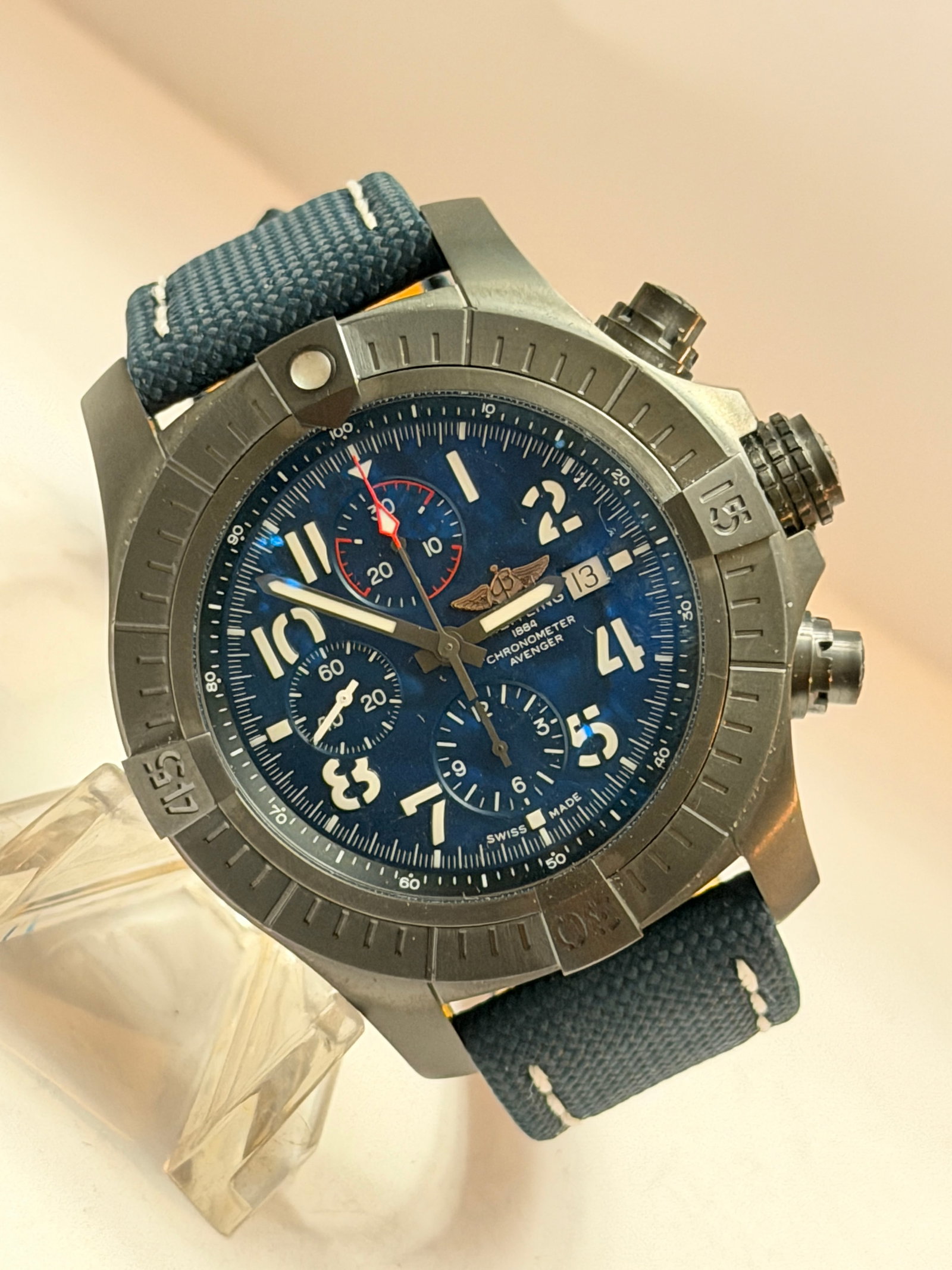 Breitling Avenger Chronograph 45 Night Mission Blue Dial Automatic Men?s Watch V133171: Bold and rugged Breitling Avenger Chronograph 45 Night Mission featuring a striking deep blue dial housed in a matte black titanium case. This modern aviation-inspired chronograph showcases oversized 
